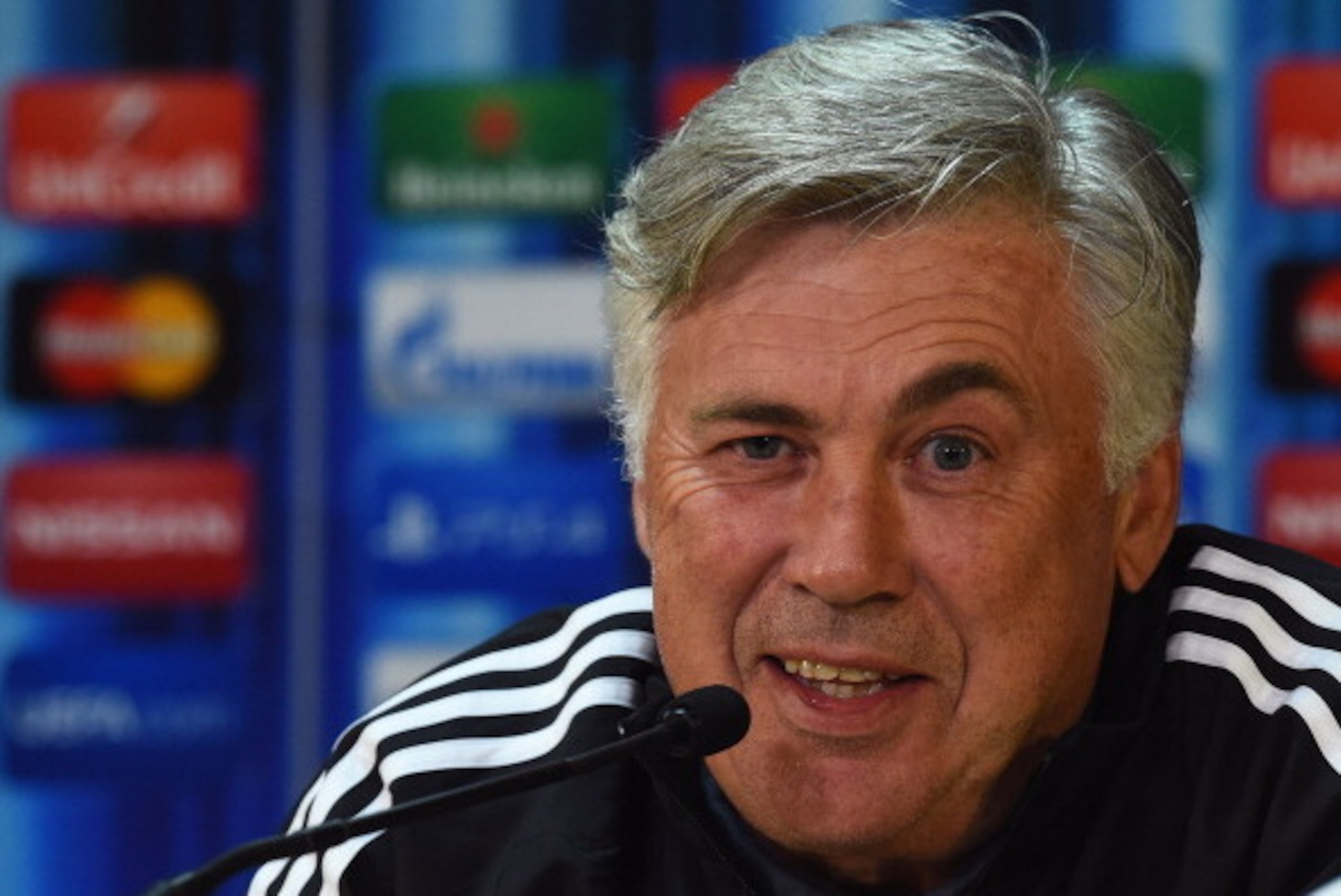 CARDIFF, WALES - AUGUST 11:  In this handout image provided by UEFA, Real Madrid Manager Carlo Ancelotti during the Real Madrid press conference at Cardiff City Stadium on August 11, 2014 in Cardiff, Wales.  (Photo by Handout/UEFA via Getty Images)