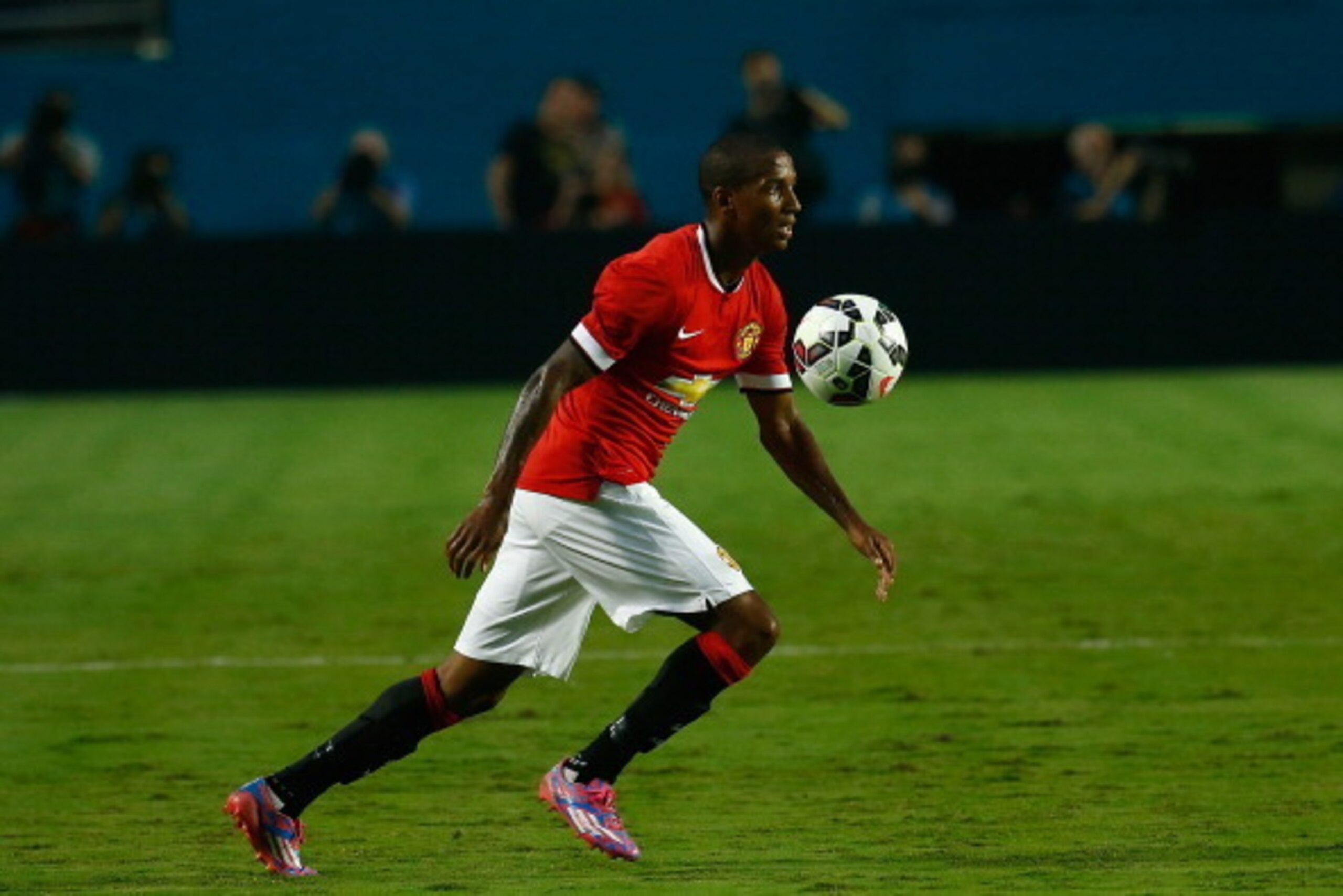 MIAMI GARDENS, FL - AUGUST 04:  Ashley Young #18 of Manchester United in action against Liverpool in the Guinness International Champions Cup 2014 Final at Sun Life Stadium on August 4, 2014 in Miami Gardens, Florida.  (Photo by Chris Trotman/Getty Images