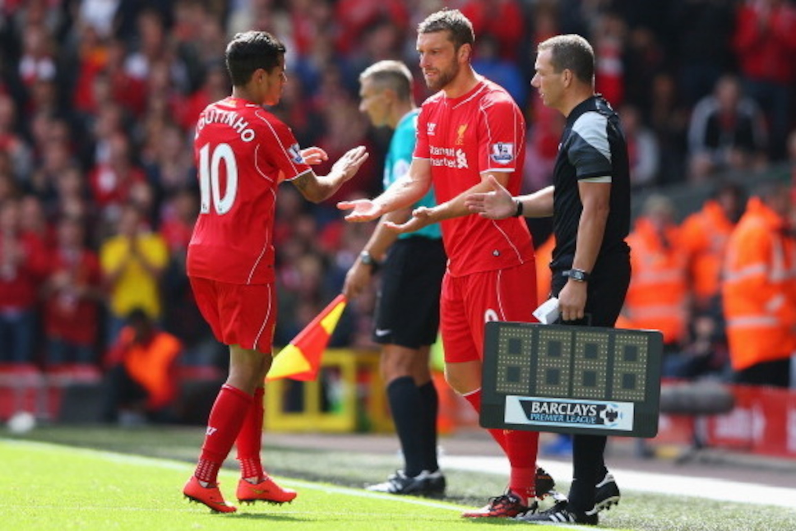 LIVERPOOL, ENGLAND - AUGUST 17:  Rickie Lambert of Liverpool comes on as a substitute for Philippe Coutinho during the Barclays Premier League match between Liverpool and Southampton at Anfield on August 17, 2014 in Liverpool, England.  (Photo by Alex Liv