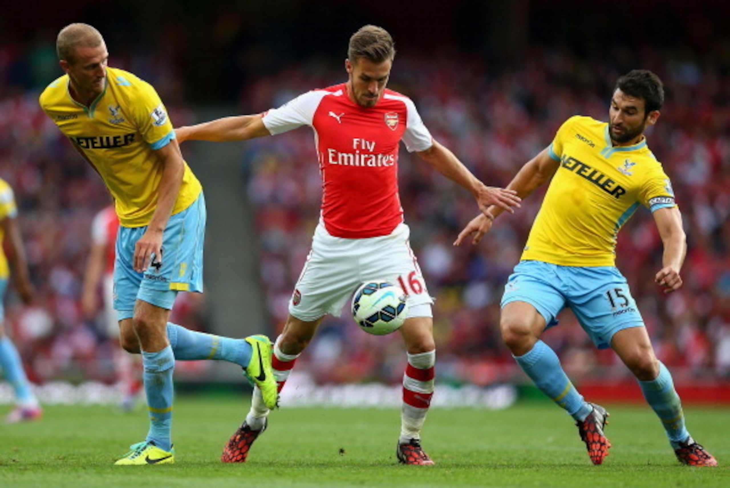 LONDON, ENGLAND - AUGUST 16:  Aaron Ramsey of Arsenal in action during the Barclays Premier League match between Arsenal and Crystal Palace at Emirates Stadium on August 16, 2014 in London, England.  (Photo by Clive Mason/Getty Images)