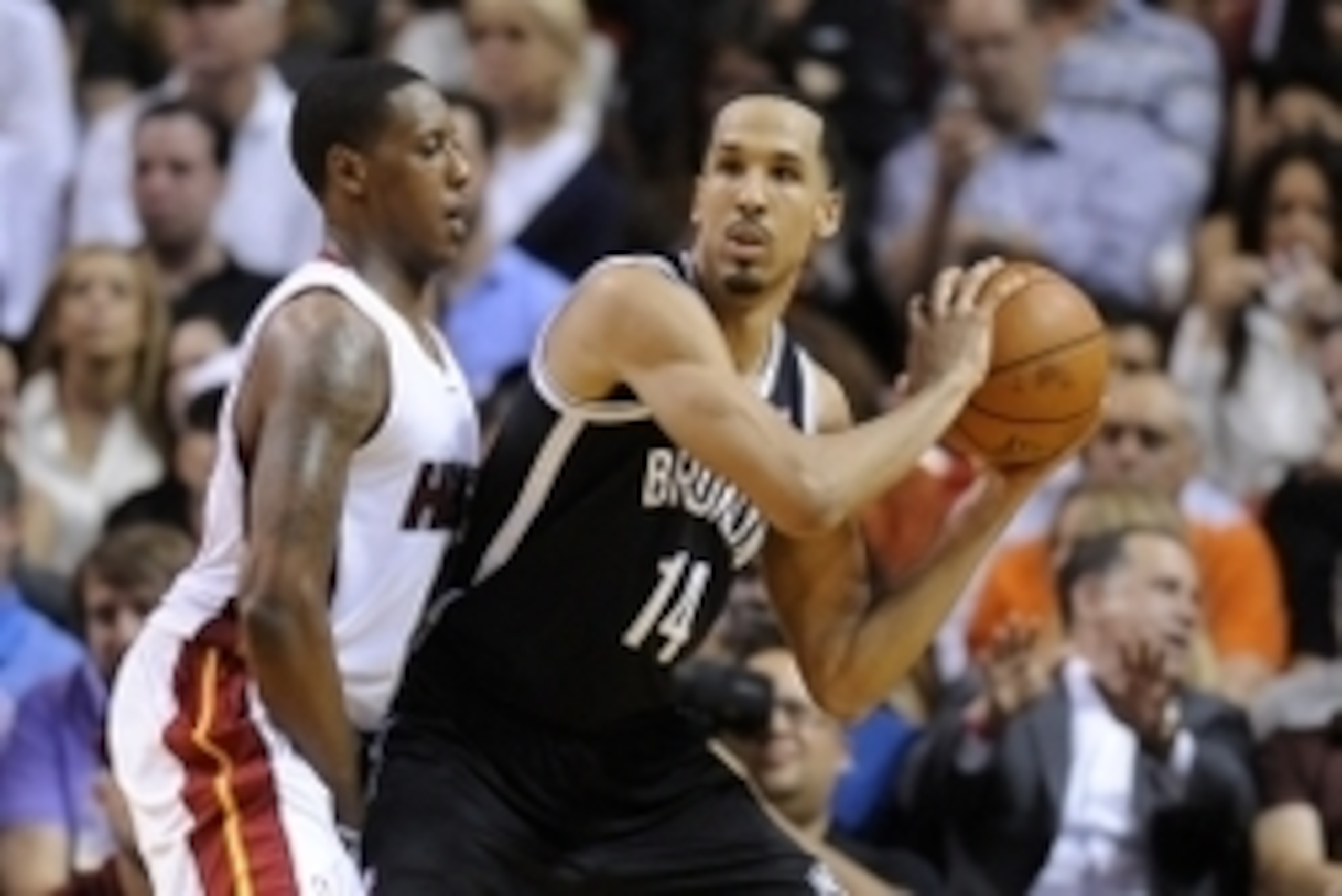 Apr 8, 2014; Miami, FL, USA; Brooklyn Nets guard Shaun Livingston (14) is pressured by Miami Heat guard Mario Chalmers (15) during the second half at American Airlines Arena. The Nets won 88-87. Mandatory Credit: Steve Mitchell-USA TODAY Sports
