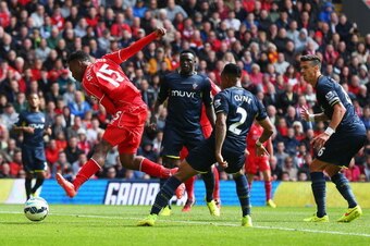 LIVERPOOL, ENGLAND - AUGUST 17:  Daniel Sturridge of Liverpool scores his goal during the Barclays Premier League match between Liverpool and Southampton at Anfield on August 17, 2014 in Liverpool, England.  (Photo by Alex Livesey/Getty Images)