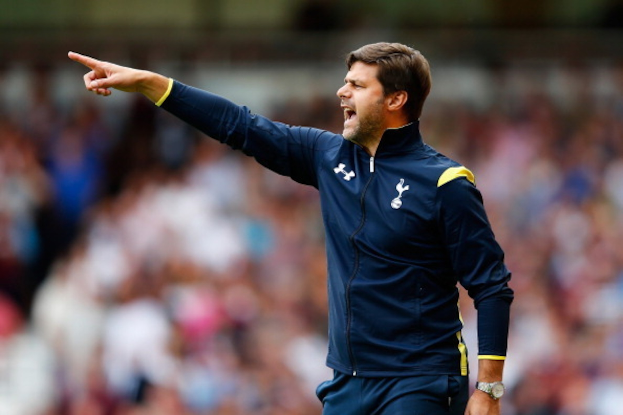 LONDON, ENGLAND - AUGUST 16:  Mauricio Pochettino the Spurs manager directs his side during the Barclays Premier League match between West Ham United and Tottenham Hotspur at Boleyn Ground on August 16, 2014 in London, England.  (Photo by Julian Finney/Ge