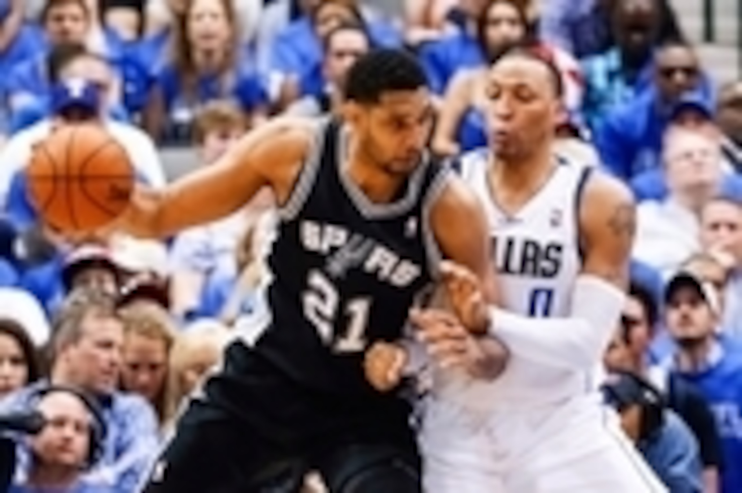 Apr 26, 2014; Dallas, TX, USA; San Antonio Spurs forward Tim Duncan (21) drives on Dallas Mavericks forward Shawn Marion (0) during the game in game three of the first round of the 2014 NBA Playoffs at American Airlines Center. Dallas won 109-108. Mandato