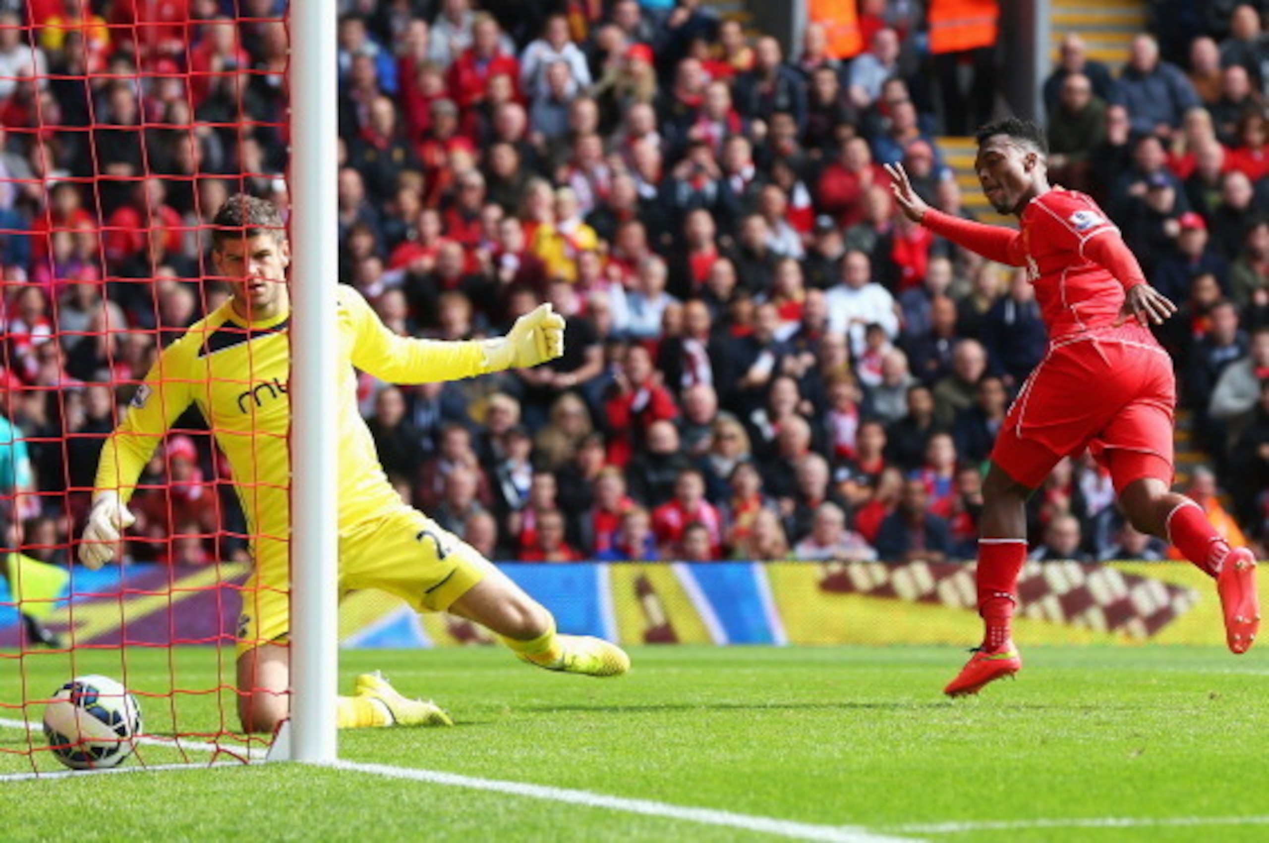 LIVERPOOL, ENGLAND - AUGUST 17:  Daniel Sturridge of Liverpool scores his goal during the Barclays Premier League match between Liverpool and Southampton at Anfield on August 17, 2014 in Liverpool, England.  (Photo by Alex Livesey/Getty Images)