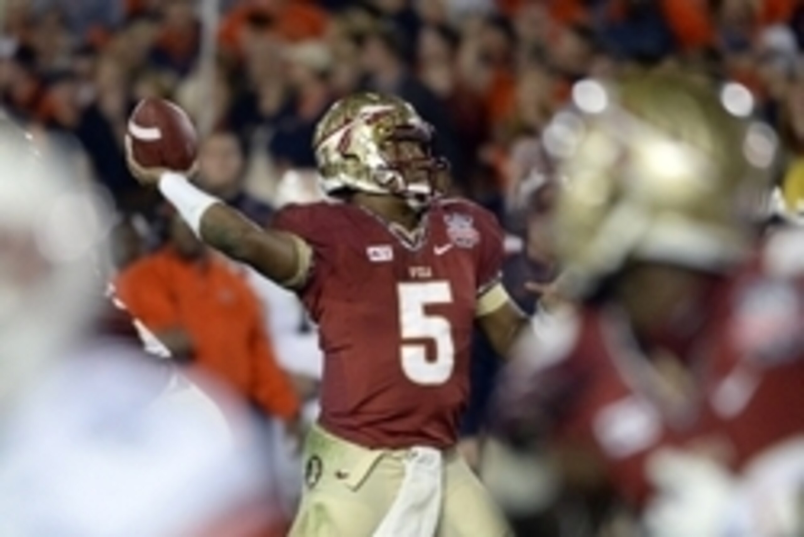 Jan 6, 2014; Pasadena, CA, USA; Florida State Seminoles quarterback Jameis Winston (5) throws against the Auburn Tigers during the second half of the 2014 BCS National Championship game at the Rose Bowl.  Mandatory Credit: Richard Mackson-USA TODAY Sports