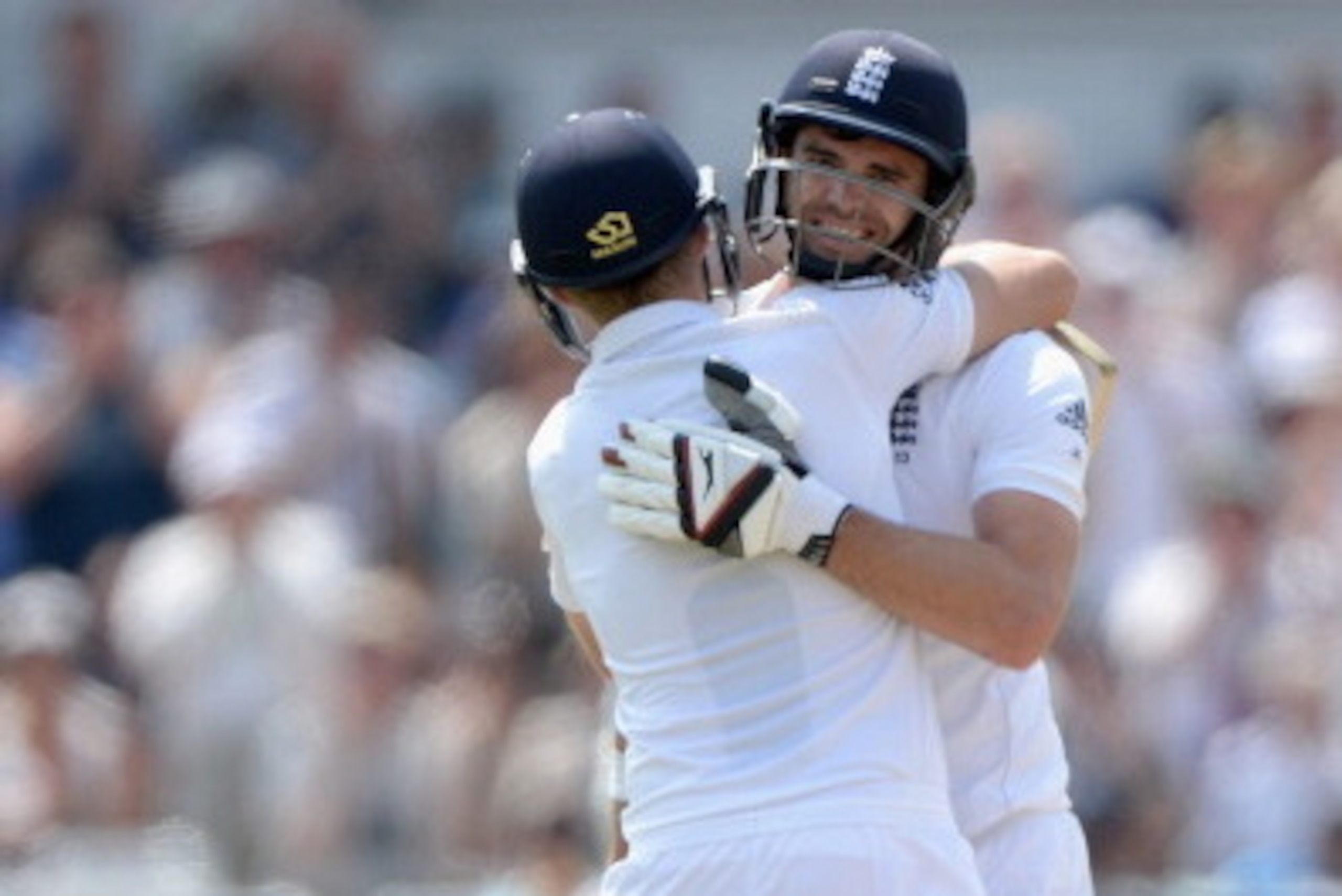 NOTTINGHAM, ENGLAND - JULY 12: James Anderson of England celebrates reaching his half century with Joe Root during day four of 1st Investec Test match between England and India at Trent Bridge on July 12, 2014 in Nottingham, England. (Photo by Gareth Co NOTTINGHAM, ENGLAND - JULY 12: James Anderson of England celebrates reaching his half century with Joe Root during day four of 1st Investec Test match between England and India at Trent Bridge on July 12, 2014 in Nottingham, England. (Photo by Gareth Co