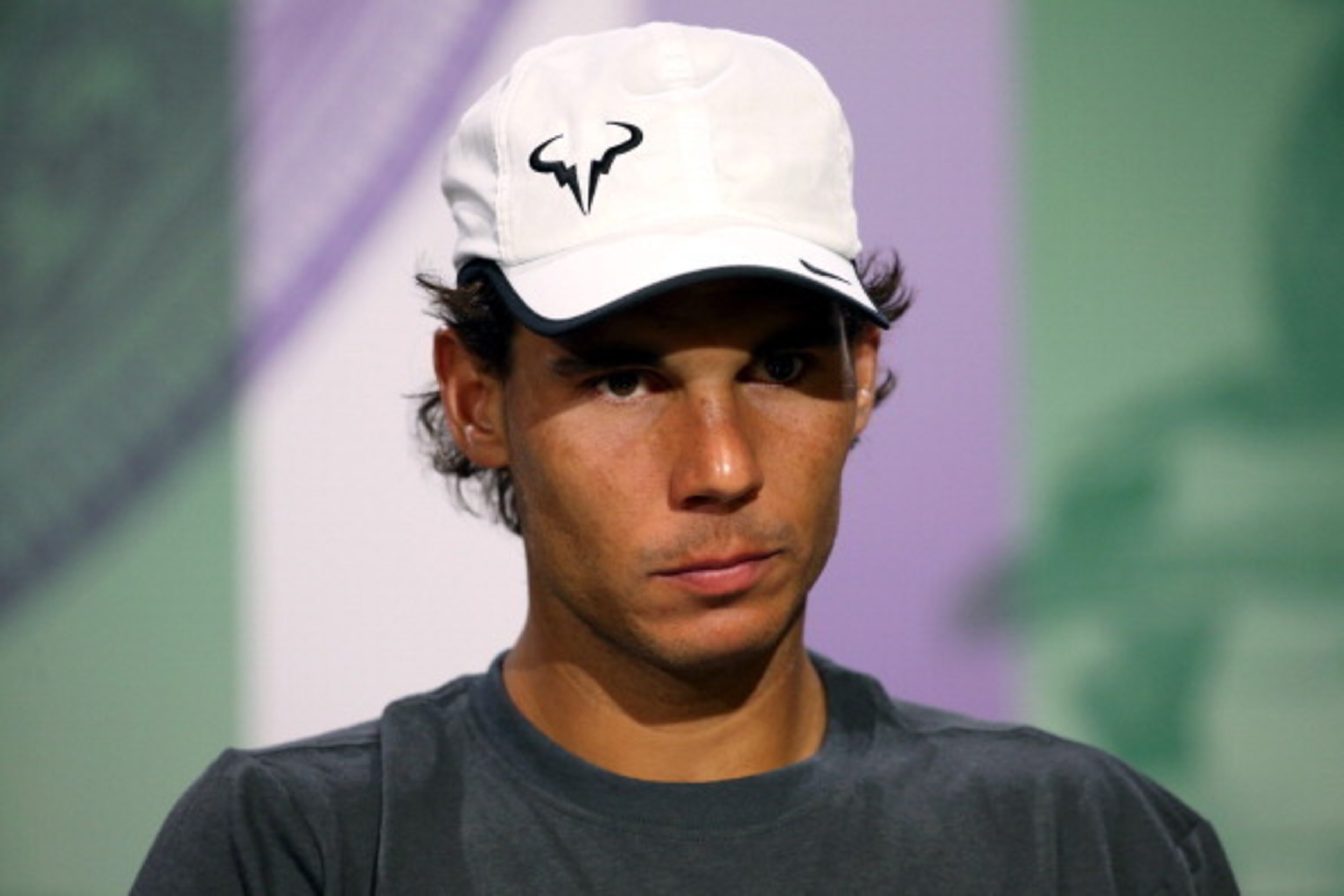 LONDON, ENGLAND - JULY 01:  Rafael Nadal of Spain speaks during a press conference after losing his Gentlemen's Singles fourth round match against Nick Kyrgios of Australia on day eight of the Wimbledon Lawn Tennis Championships at the All England Lawn Te