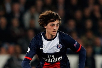 PARIS, FRANCE - MARCH 12:  Adrien Rabiot of PSG in action during the UEFA Champions League Round of 16 second leg match between Paris Saint-Germain FC and Bayer Leverkusen at Parc des Princes on March 12, 2014 in Paris, France.  (Photo by Dean Mouhtaropou
