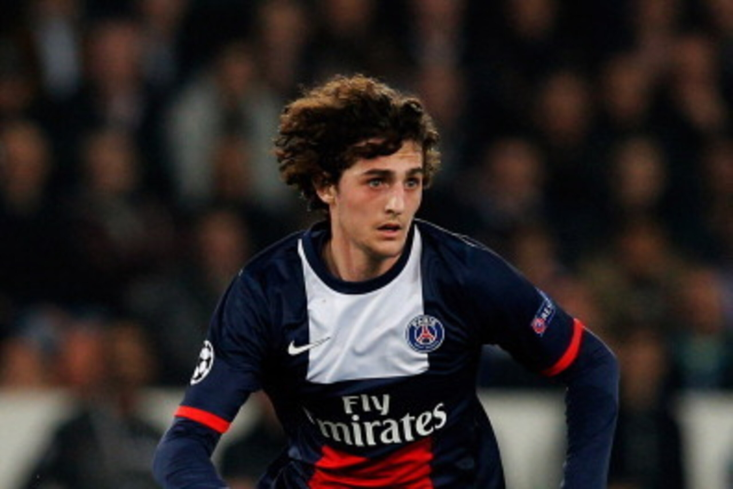 PARIS, FRANCE - MARCH 12:  Adrien Rabiot of PSG in action during the UEFA Champions League Round of 16 second leg match between Paris Saint-Germain FC and Bayer Leverkusen at Parc des Princes on March 12, 2014 in Paris, France.  (Photo by Dean Mouhtaropou
