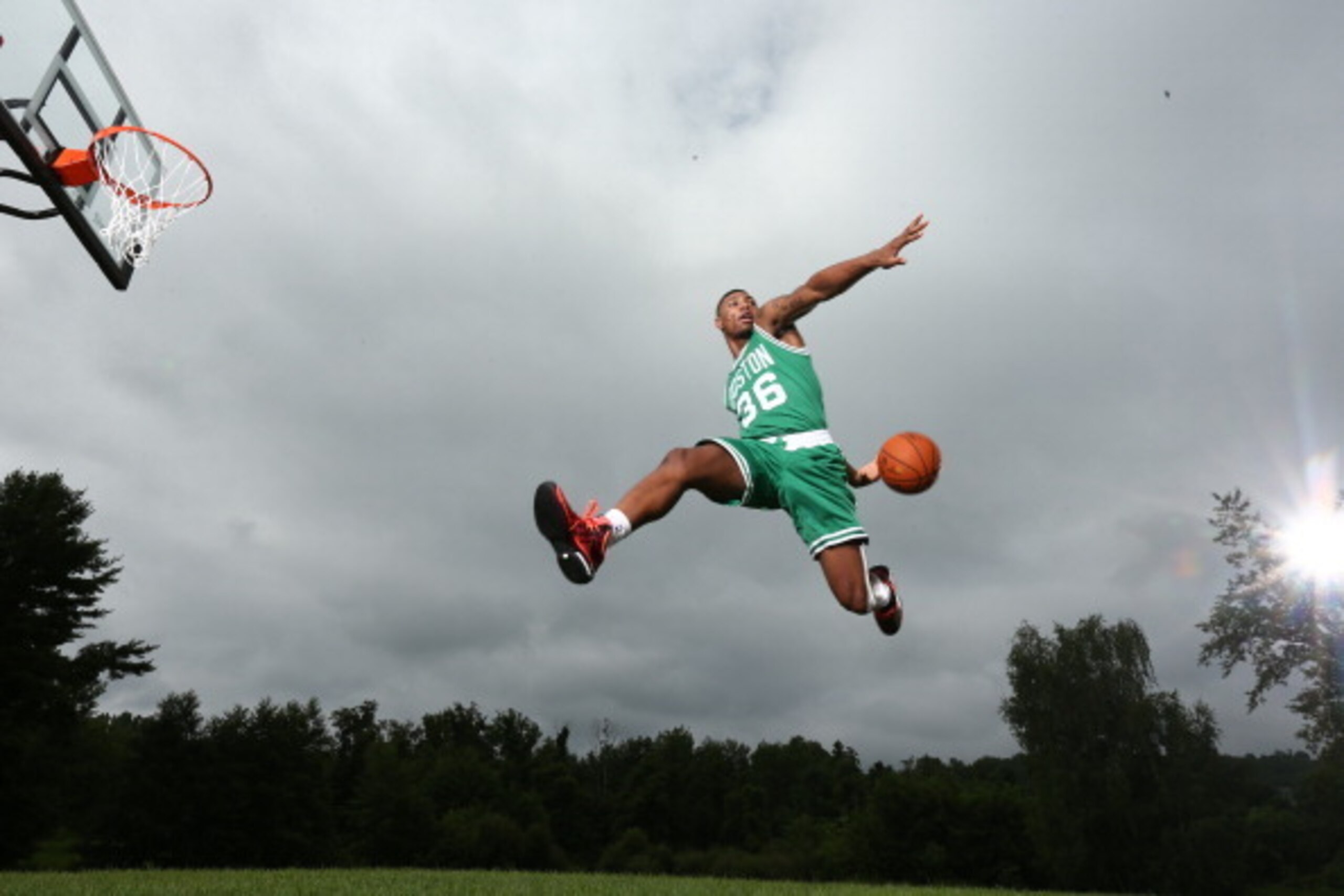 TARRYTOWN, NY - AUGUST 3: Marcus Smart #36 of the Boston Celtics poses for a portrait during the 2014 NBA rookie photo shoot on August 3, 2014 at the Madison Square Garden Training Facility in Tarrytown, New York. NOTE TO USER: User expressly acknowledges