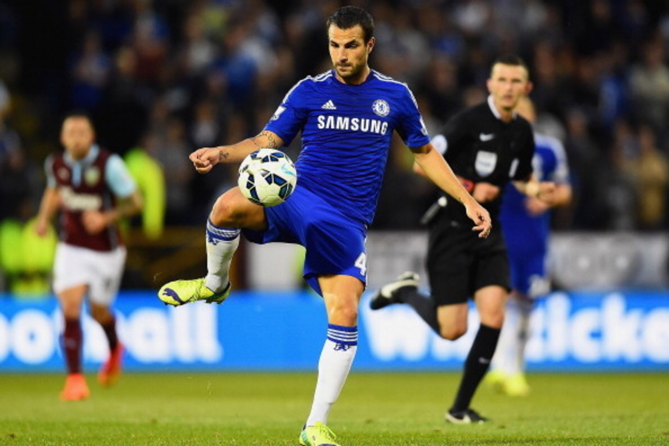 BURNLEY, ENGLAND - AUGUST 18:  Cesc Fabregas of Chelsea controls the ball during the Barclays Premier League match between Burnley and Chelsea at Turf Moor on August 18, 2014 in Burnley, England.  (Photo by Laurence Griffiths/Getty Images)