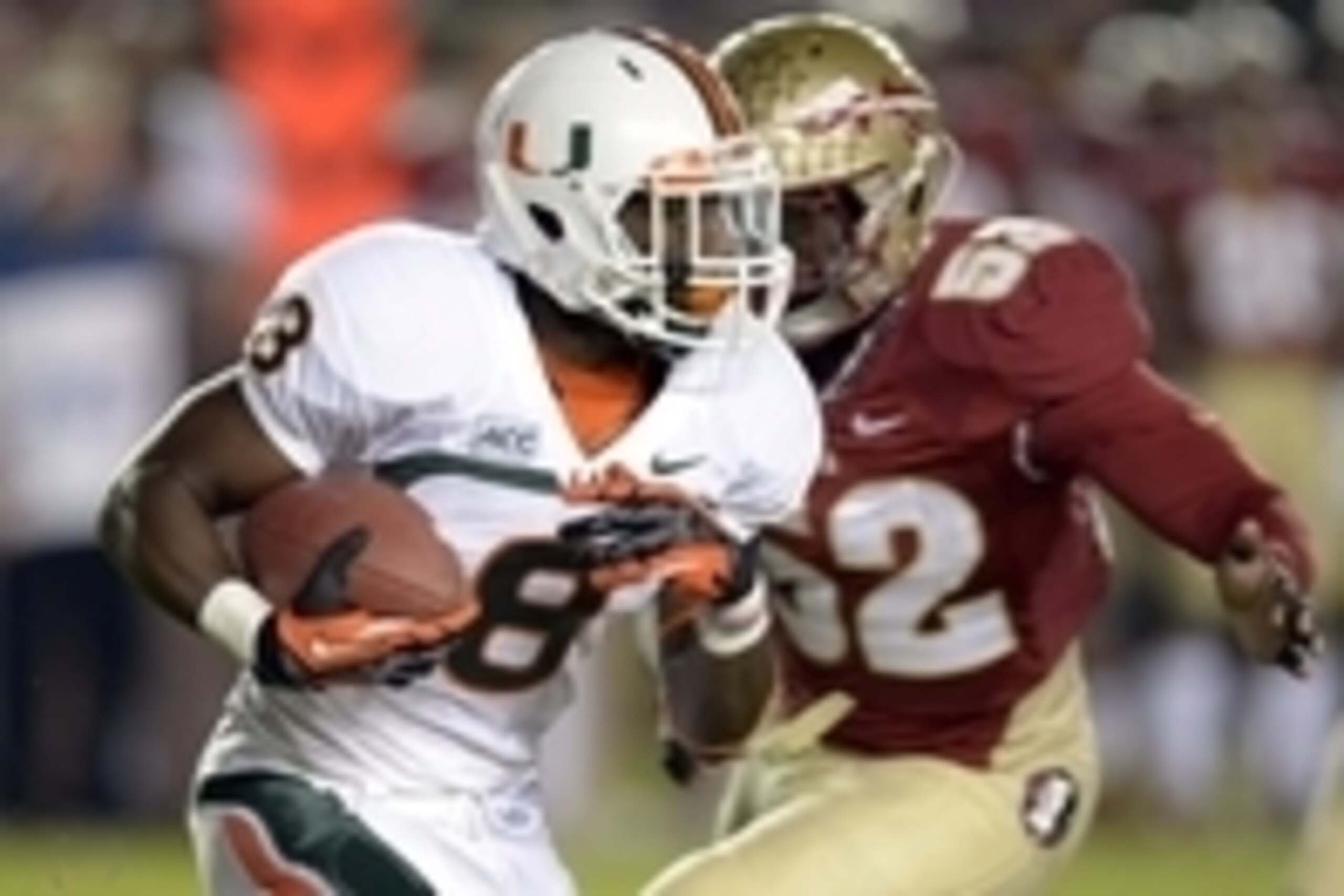 Nov 2, 2013; Tallahassee, FL, USA; Miami Hurricanes running back Duke Johnson (8) carries against the Florida State Seminoles during the first quarter at Doak Campbell Stadium. Mandatory Credit: John David Mercer-USA TODAY Sports