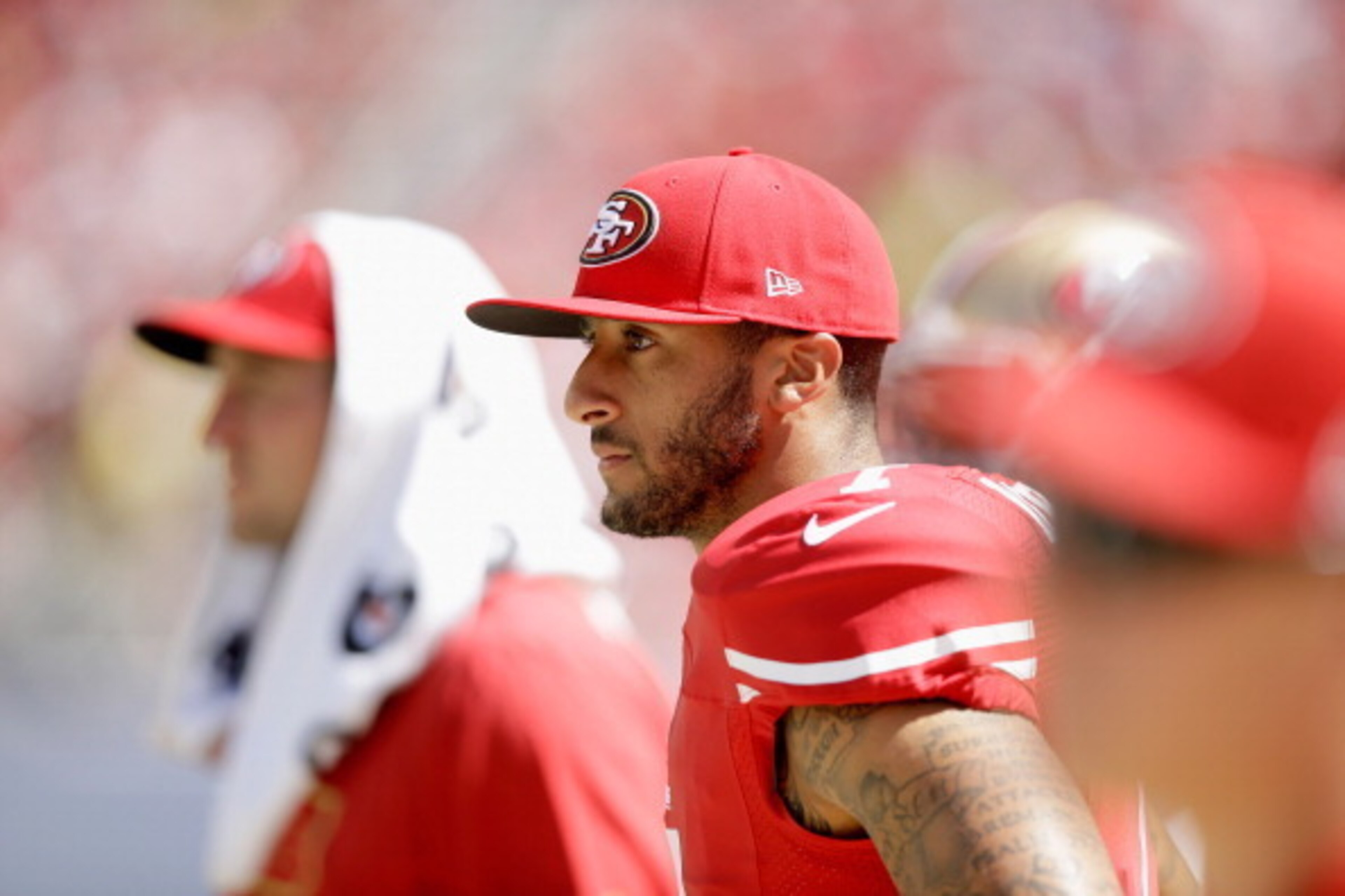 SANTA CLARA, CA - AUGUST 17:  Quarterback Colin Kaepernick #7 of the San Francisco 49ers stands on the sidelines during their preseason game against the Denver Broncos at Levi's Stadium on August 17, 2014 in Santa Clara, California.  (Photo by Ezra Shaw/G