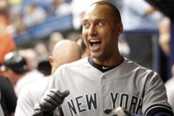 Aug 17, 2014; St. Petersburg, FL, USA; New York Yankees shortstop Derek Jeter (2) gets pumped up in the dugout before the game against the Tampa Bay Rays at Tropicana Field. Mandatory Credit: Kim Klement-USA TODAY Sports