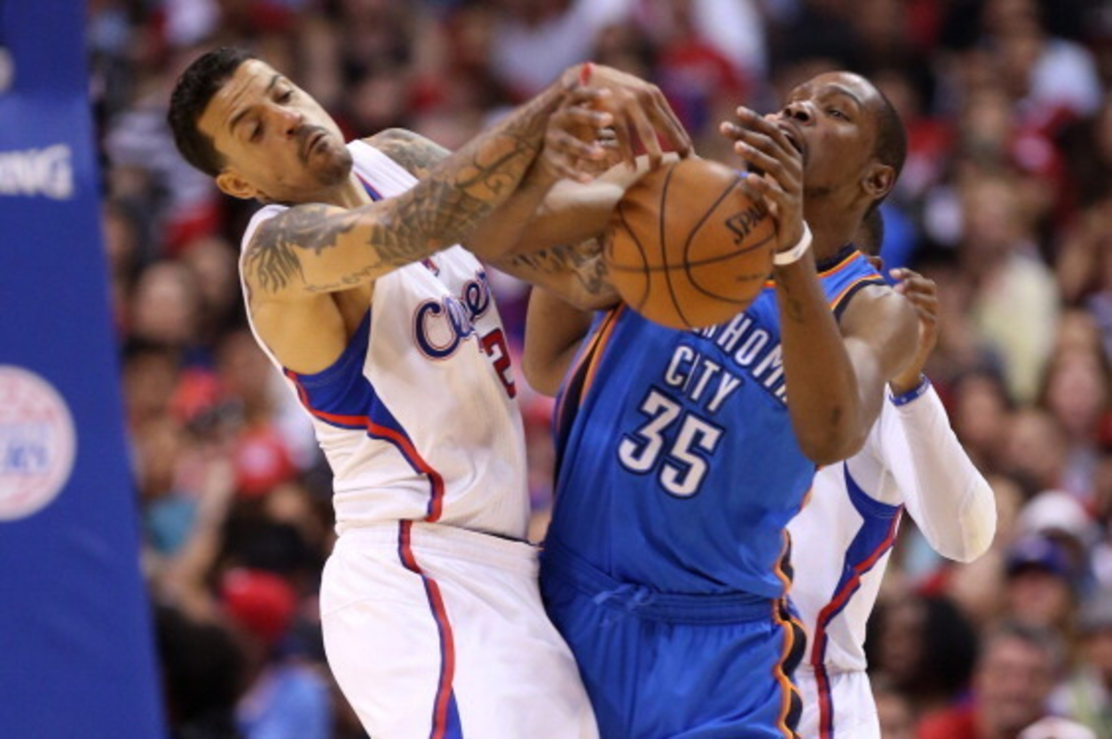 LOS ANGELES, CA - MAY 11:  Kevin Durant #35 of the Oklahoma City Thunder and Matt Barnes #22 of the Los Angeles Clippers fight for the ball in Game Four of the Western Conference Semifinals during the 2014 NBA Playoffs at Staples Center on May 11, 2014 in
