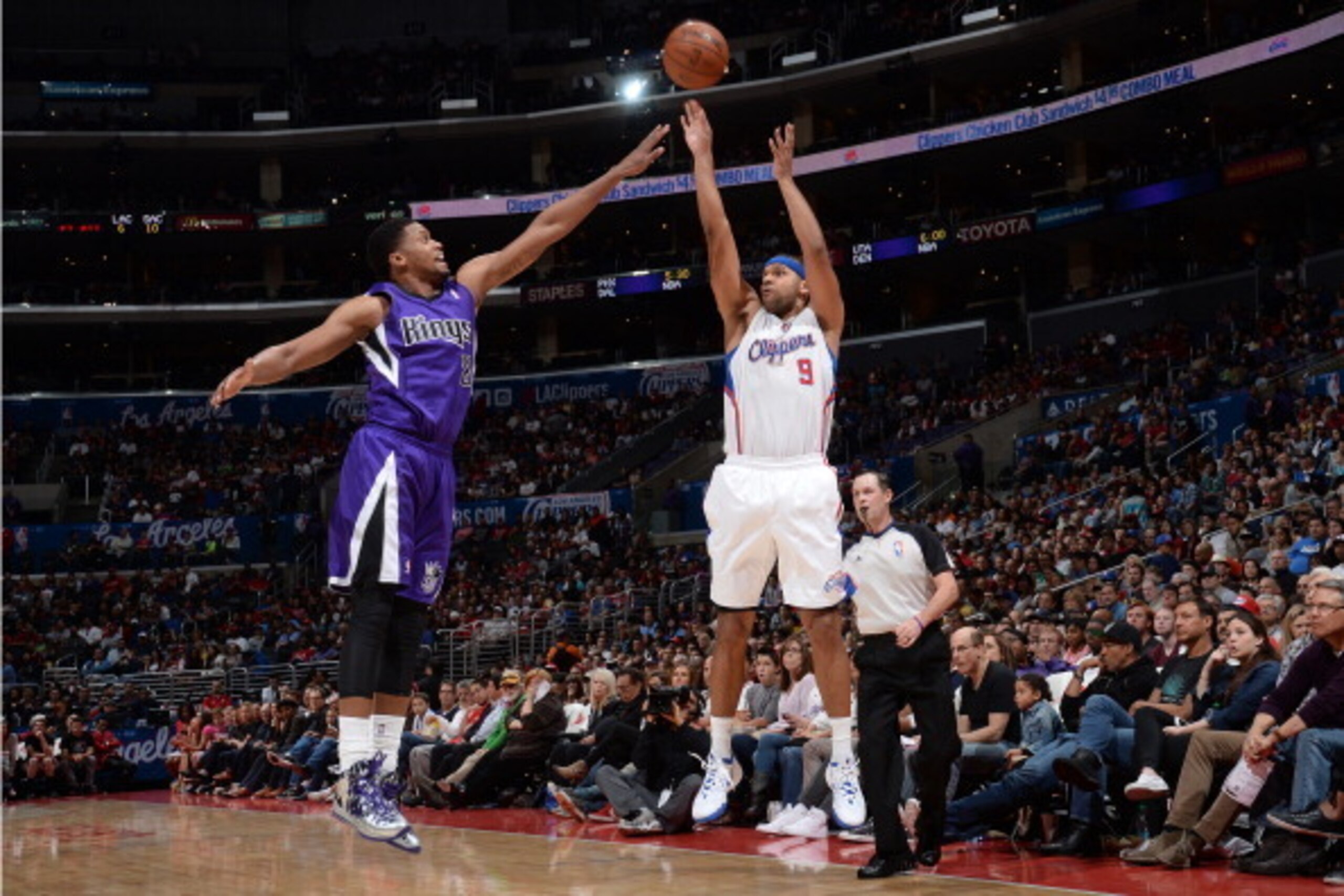 LOS ANGELES, CA - APRIL 12: Jared Dudley #9 of the Los Angeles Clippers shoots the ball during the game against the Sacramento Kings at Staples Center on April 12, 2014 in Los Angeles, California. NOTE TO USER: User expressly acknowledges and agrees that,