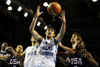 AUCKLAND, NEW ZEALAND - JULY 12:  Kostas Papanikolaou of Greece secures the rebound during the U19 Basketball World Championships Final match between Greece and the United States of America at North Shore Events Centre on July 12, 2009 in Auckland, New Ze