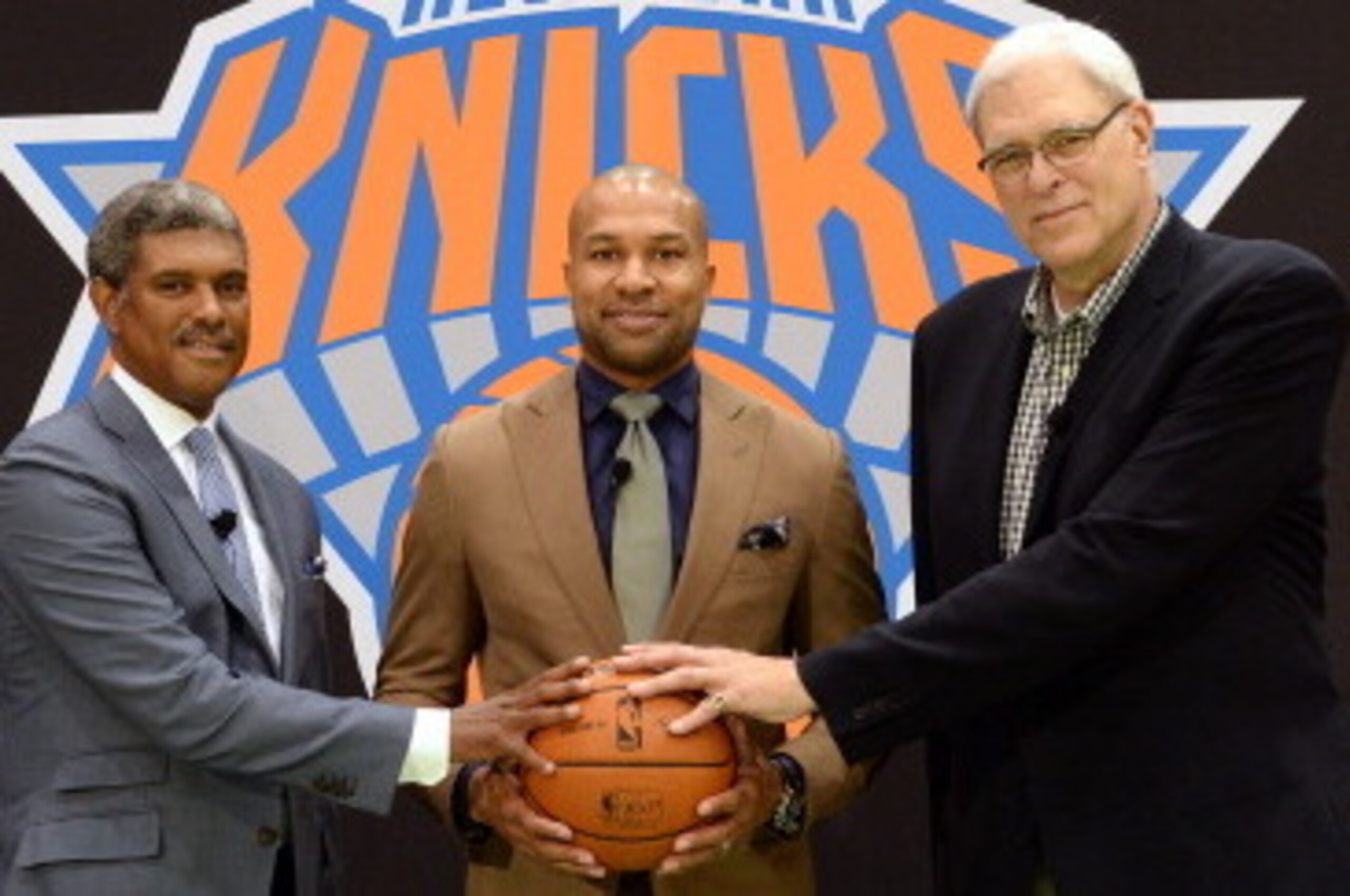 GREENBURGH, NY - JUNE 10:  (L-R) Steve Mills, Derek Fisher and Phil Jackson pose for a photo during the announcement of Derek Fisher as head coach of the New York Knicks at a press conference on June 10, 2014 in Greenburgh, New York. NOTE TO USER: User ex