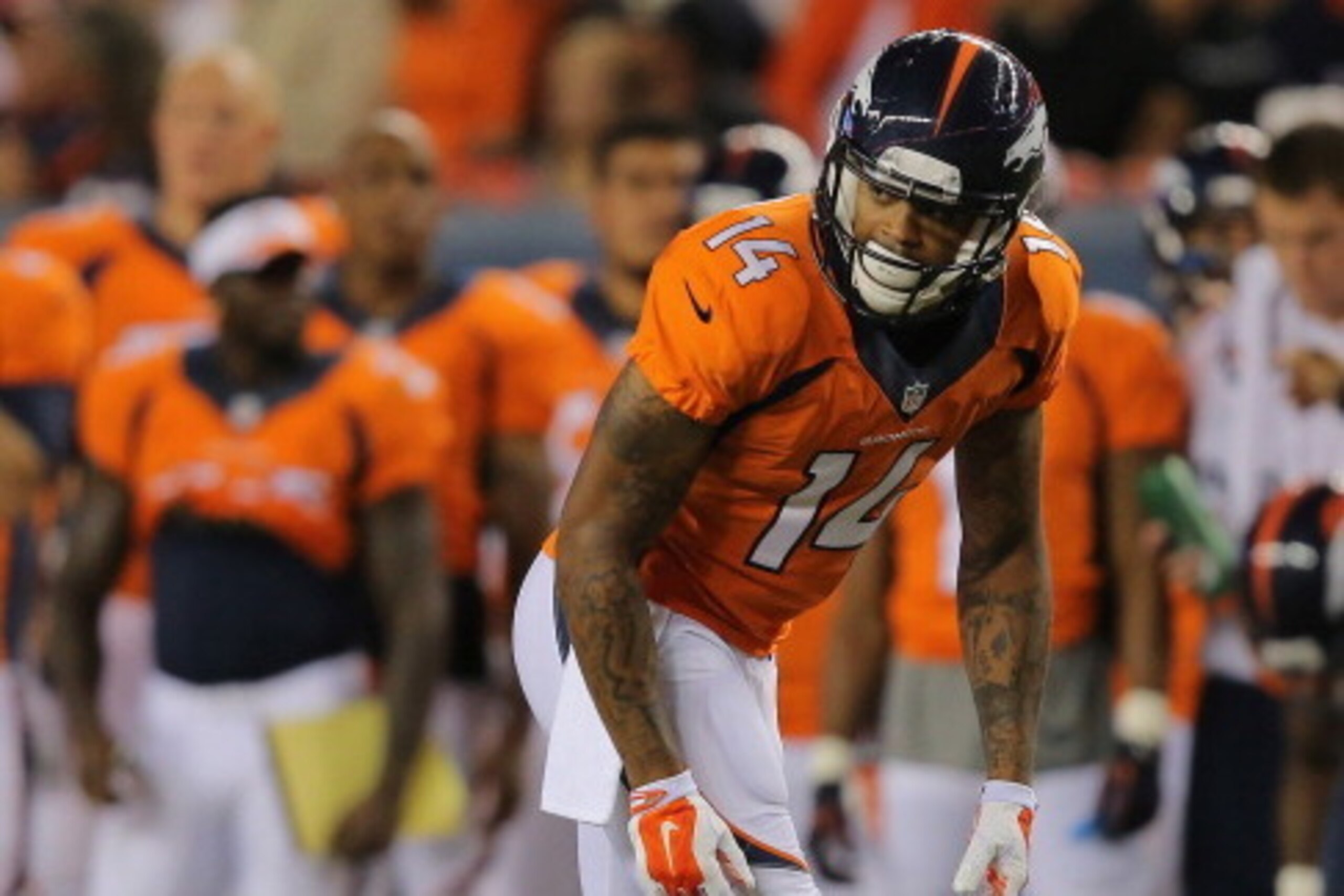 DENVER, CO - AUGUST 07:  Wide receiver Cody Latimer #14 of the Denver Broncos lines up against the Seattle Seahawks during preseason action at Sports Authority Field at Mile High on August 7, 2014 in Denver, Colorado. The Broncos defeated the Seahawks 21-