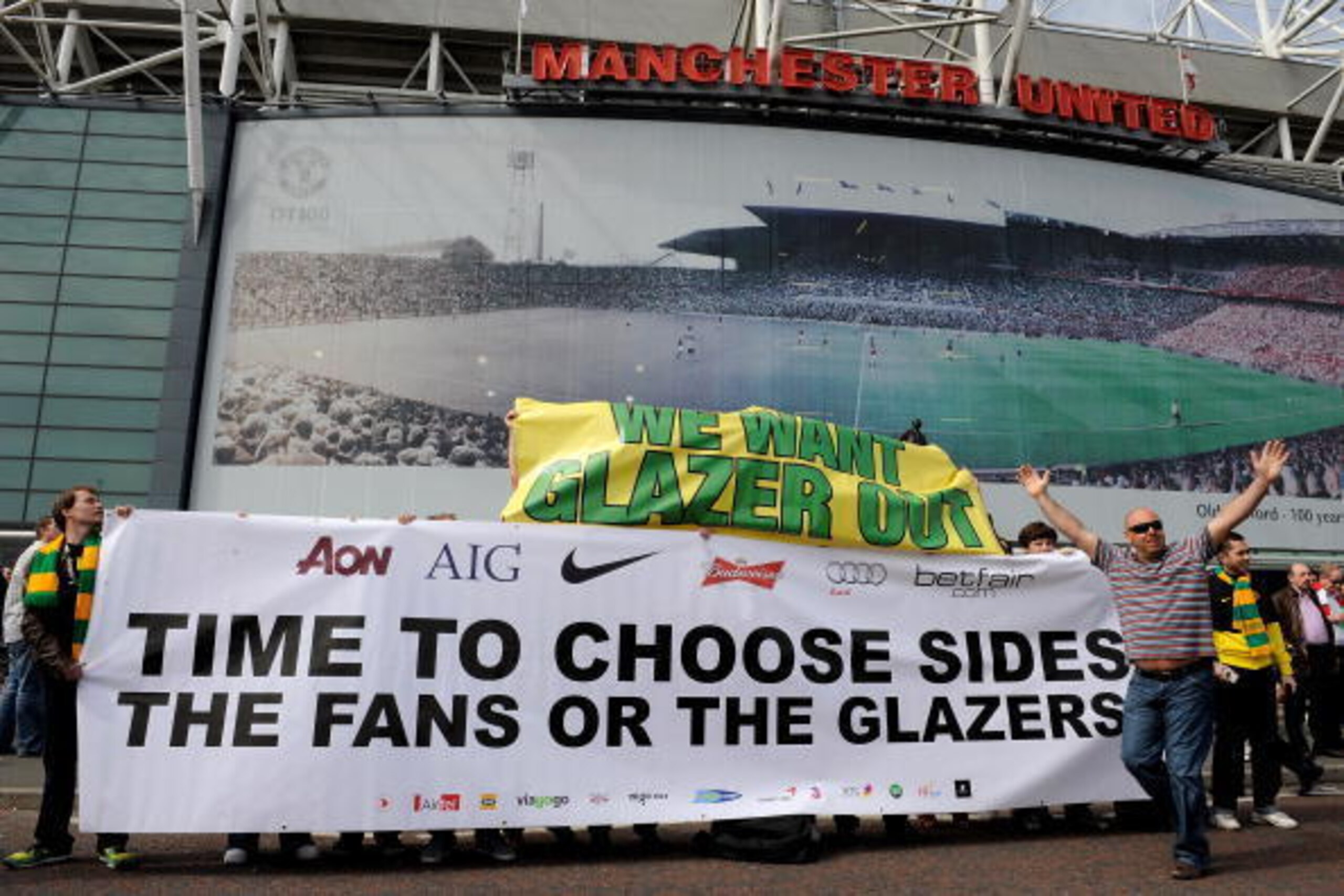 MANCHESTER, ENGLAND - APRIL 24:  Manchester United fans display a banner protesting against the club's owners prior to the Barclays Premier League match between Manchester United and Tottenham Hotspur at Old Trafford on April 24, 2010 in Manchester, Engla
