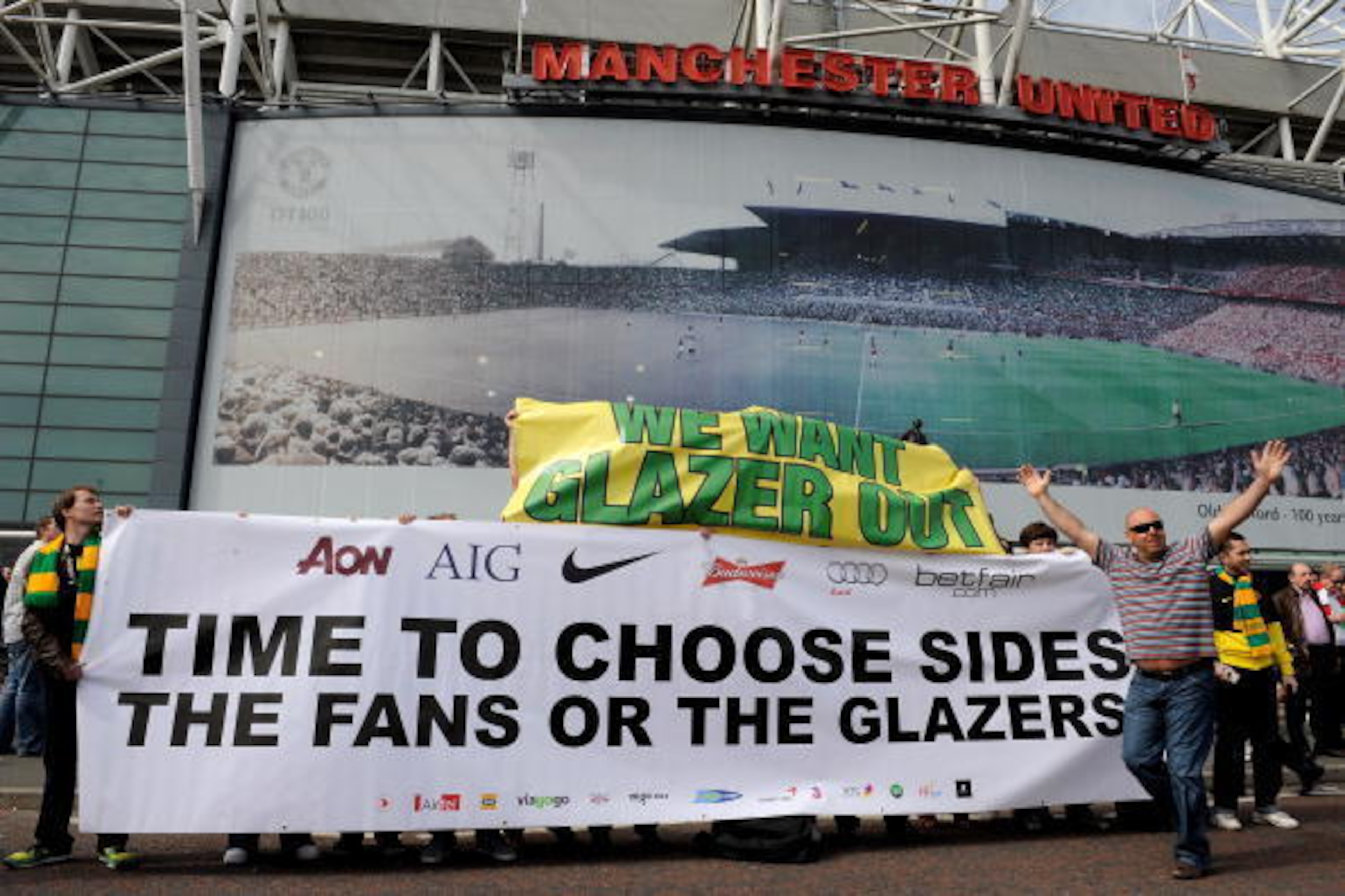 MANCHESTER, ENGLAND - APRIL 24:  Manchester United fans display a banner protesting against the club's owners prior to the Barclays Premier League match between Manchester United and Tottenham Hotspur at Old Trafford on April 24, 2010 in Manchester, Engla