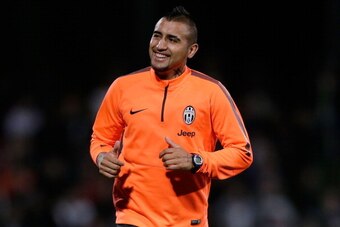 SYDNEY, AUSTRALIA - AUGUST 09:  Arturo Vidal smiles during a Juventus training session at WIN Jubilee Stadium on August 9, 2014 in Sydney, Australia.  (Photo by Mark Metcalfe/Getty Images)