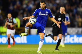 BURNLEY, ENGLAND - AUGUST 18:  Cesc Fabregas of Chelsea controls the ball during the Barclays Premier League match between Burnley and Chelsea at Turf Moor on August 18, 2014 in Burnley, England.  (Photo by Laurence Griffiths/Getty Images)