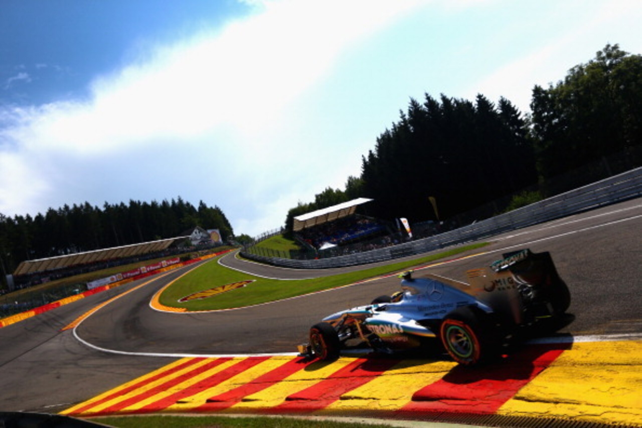 SPA, BELGIUM - AUGUST 23:  Lewis Hamilton of Great Britain and Mercedes GP drives thru Eau Rouge during practice for the Belgian Grand Prix at Circuit de Spa-Francorchamps on August 23, 2013 in Spa, Belgium.  (Photo by Clive Mason/Getty Images)