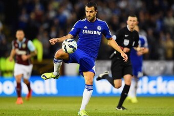BURNLEY, ENGLAND - AUGUST 18:  Cesc Fabregas of Chelsea controls the ball during the Barclays Premier League match between Burnley and Chelsea at Turf Moor on August 18, 2014 in Burnley, England.  (Photo by Laurence Griffiths/Getty Images)