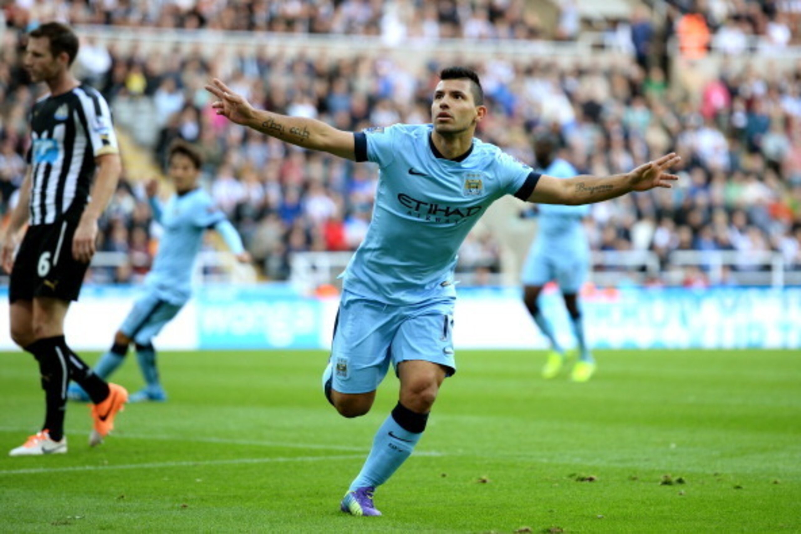NEWCASTLE UPON TYNE, ENGLAND - AUGUST 17:  Sergio Aguero of Manchester City celebrates after scoring his team's second goal during the Barclays Premier League match between Newcastle United and Manchester City at St James' Park on August 17, 2014 in Newca