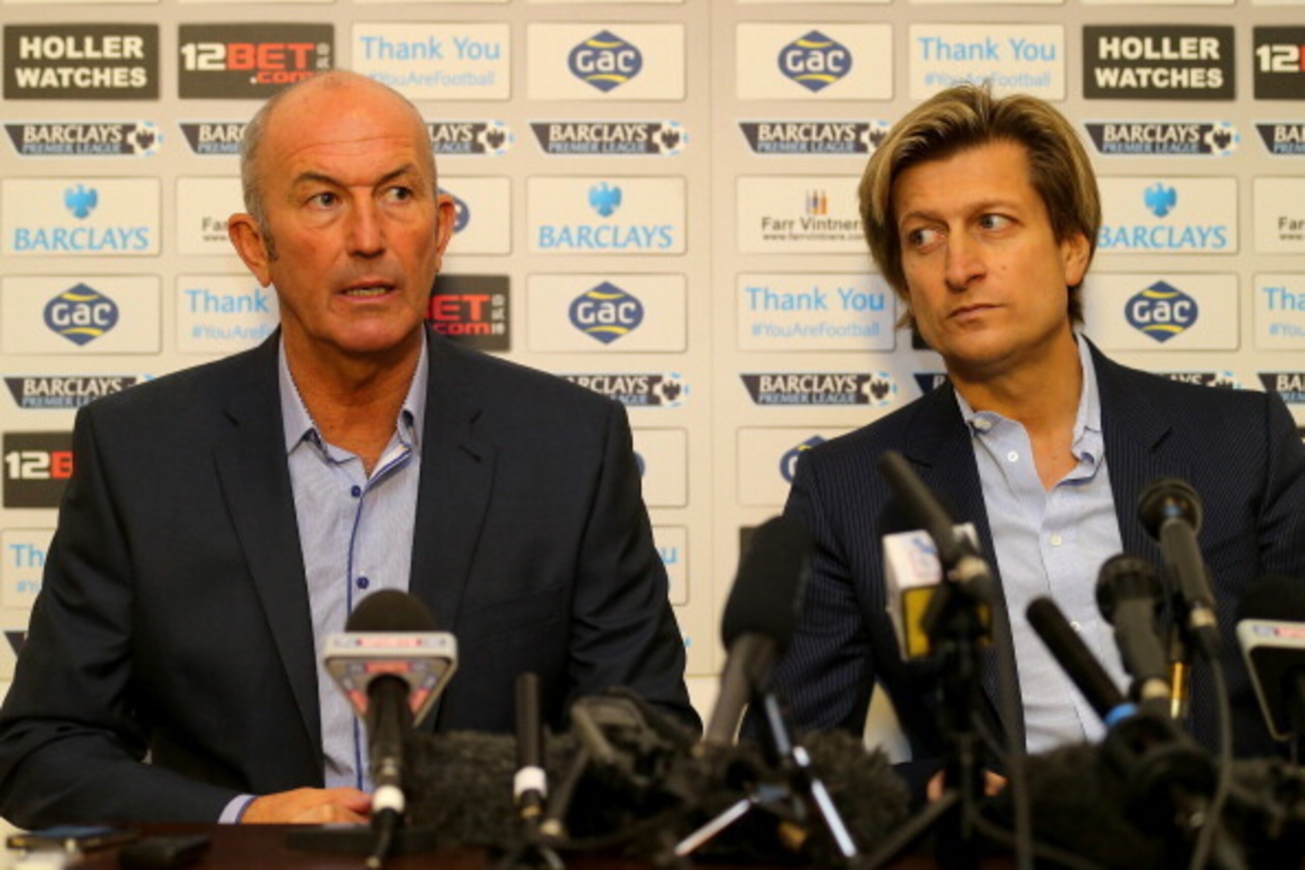 LONDON, ENGLAND - NOVEMBER 25:  Tony Pulis speaks as Chairman Steve Parish looks on during a press conference after being unveiled as the new Crystal Palace Manager on November 25, 2013 in London, England.  (Photo by Clive Rose/Getty Images)
