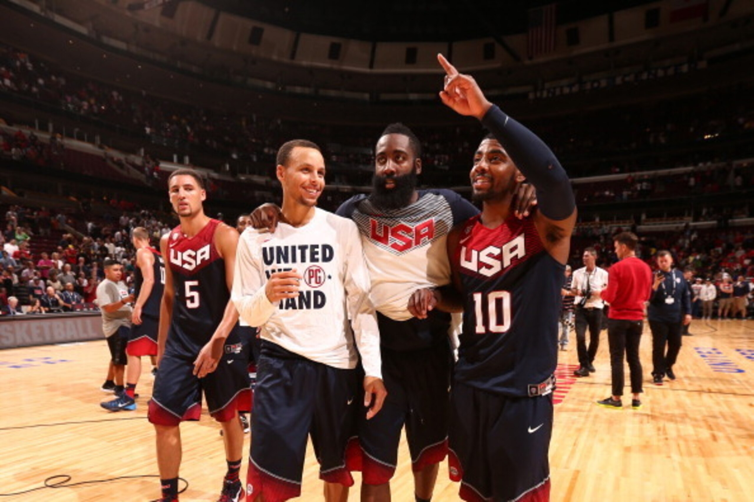 CHICAGO, IL - AUGUST 16: Teammates Stephen Curry #4, James Harden #13, and Kyrie Irving #10 of the USA Basketball Men's National Team after playing a game against the Brazil Basketball Men's National Team on August 16, 2014 at the United Center in Chicago