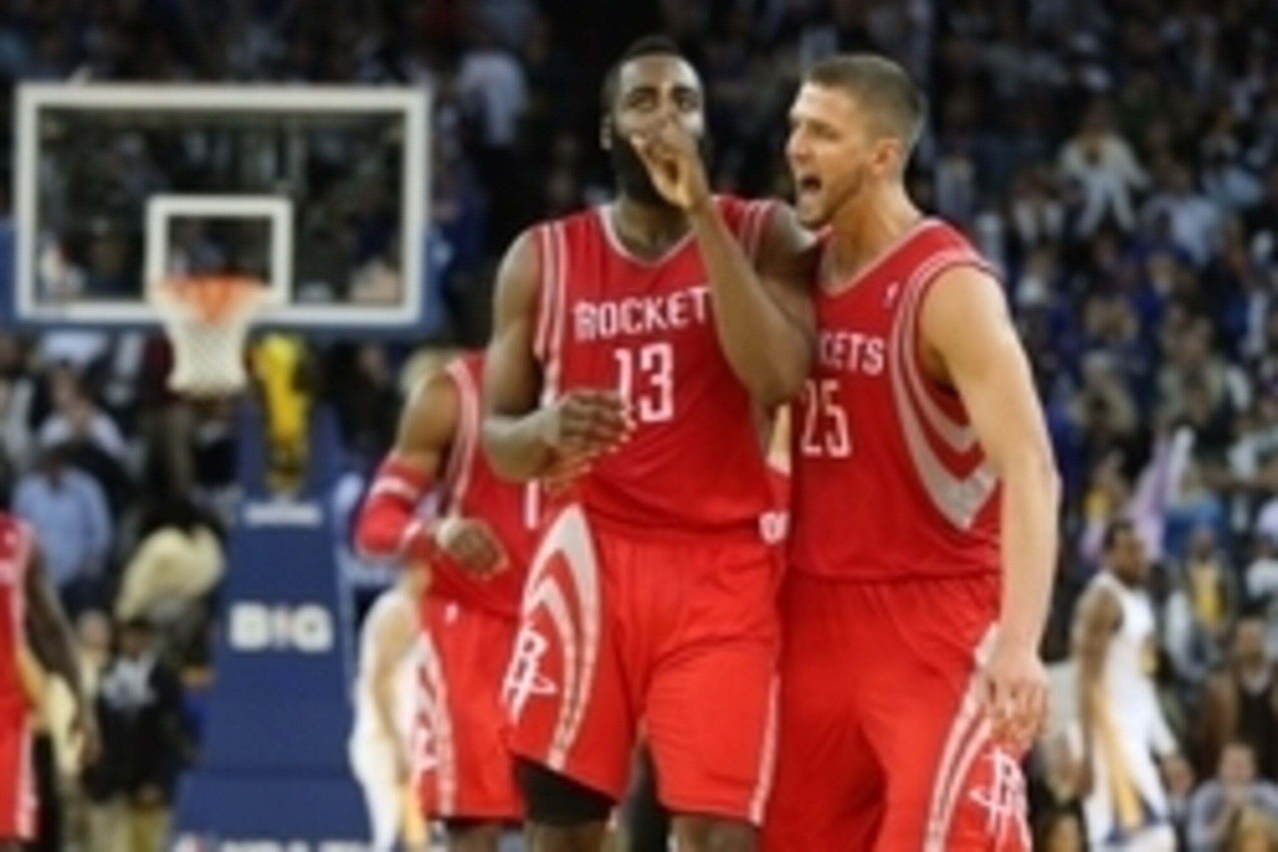 Feb 20, 2014; Oakland, CA, USA; Houston Rockets shooting guard James Harden (13) celebrates with small forward Chandler Parsons (25) after a basket against the Golden State Warriors during the fourth quarter at Oracle Arena. The Golden State Warriors defe