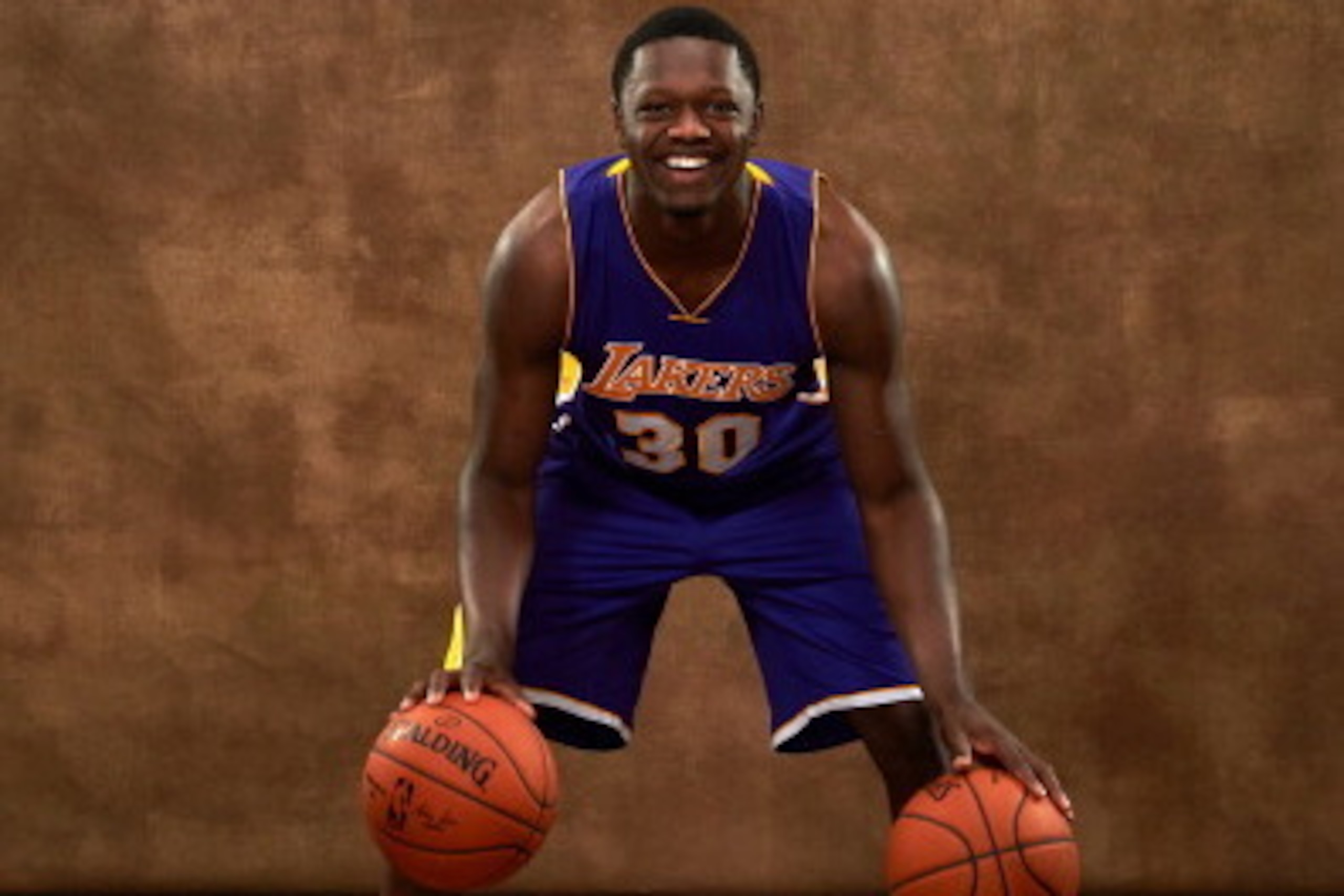 TARRYTOWN, NY - AUGUST 3:  Julius Randle #30 of the Los Angeles Lakers poses for a portrait during the 2014 NBA rookie photo shoot on August 3, 2014 at the Madison Square Garden Training Facility in Tarrytown, New York. NOTE TO USER: User expressly acknow