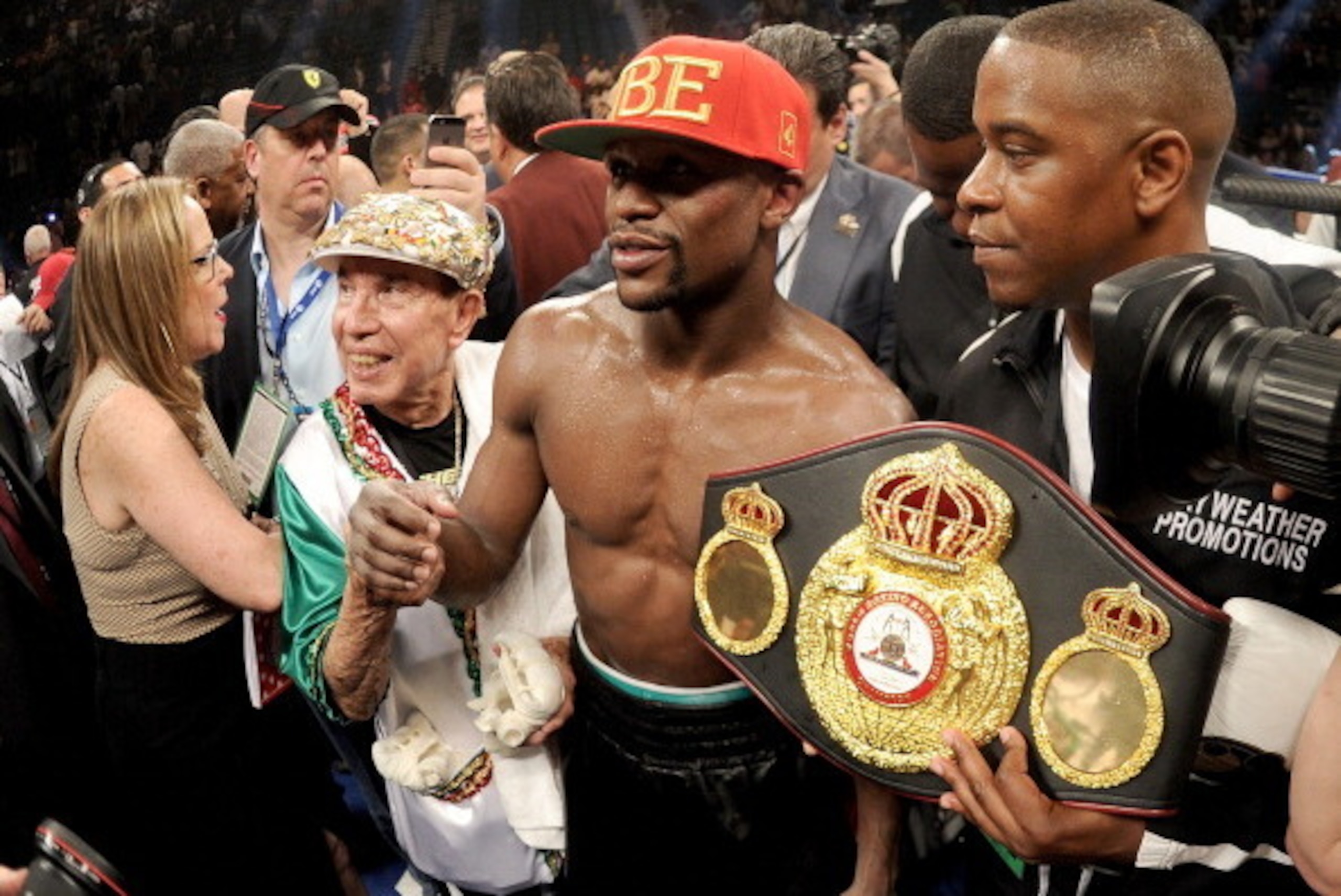 LAS VEGAS, NV - MAY 03:  Floyd Mayweather Jr. celebrates after defeating Marcos Maidana by majority decision in their WBC/WBA welterweight unification fight at the MGM Grand Garden Arena on May 3, 2014 in Las Vegas, Nevada.  (Photo by Harry How/Getty Imag