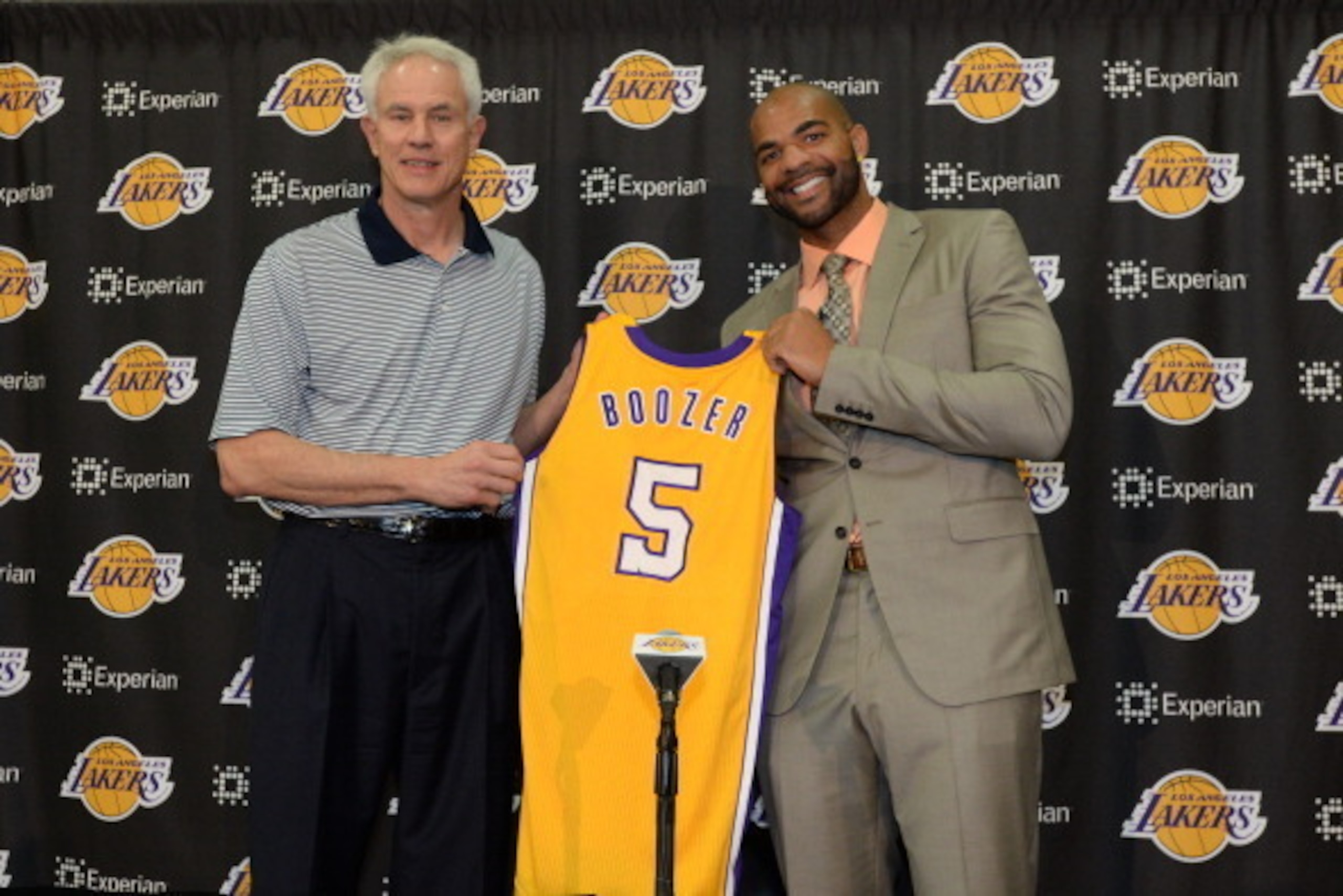 EL SEGUNDO, CA - JULY 25: Mitch Kupchak and Carlos Boozer #5 of the Los Angeles Lakers pose for a photo during a press conference at the Toyota Sports Center on July 25, 2014 in El Segundo, California. NOTE TO USER: User expressly acknowledges and agrees EL SEGUNDO, CA - JULY 25: Mitch Kupchak and Carlos Boozer #5 of the Los Angeles Lakers pose for a photo during a press conference at the Toyota Sports Center on July 25, 2014 in El Segundo, California. NOTE TO USER: User expressly acknowledges and agrees