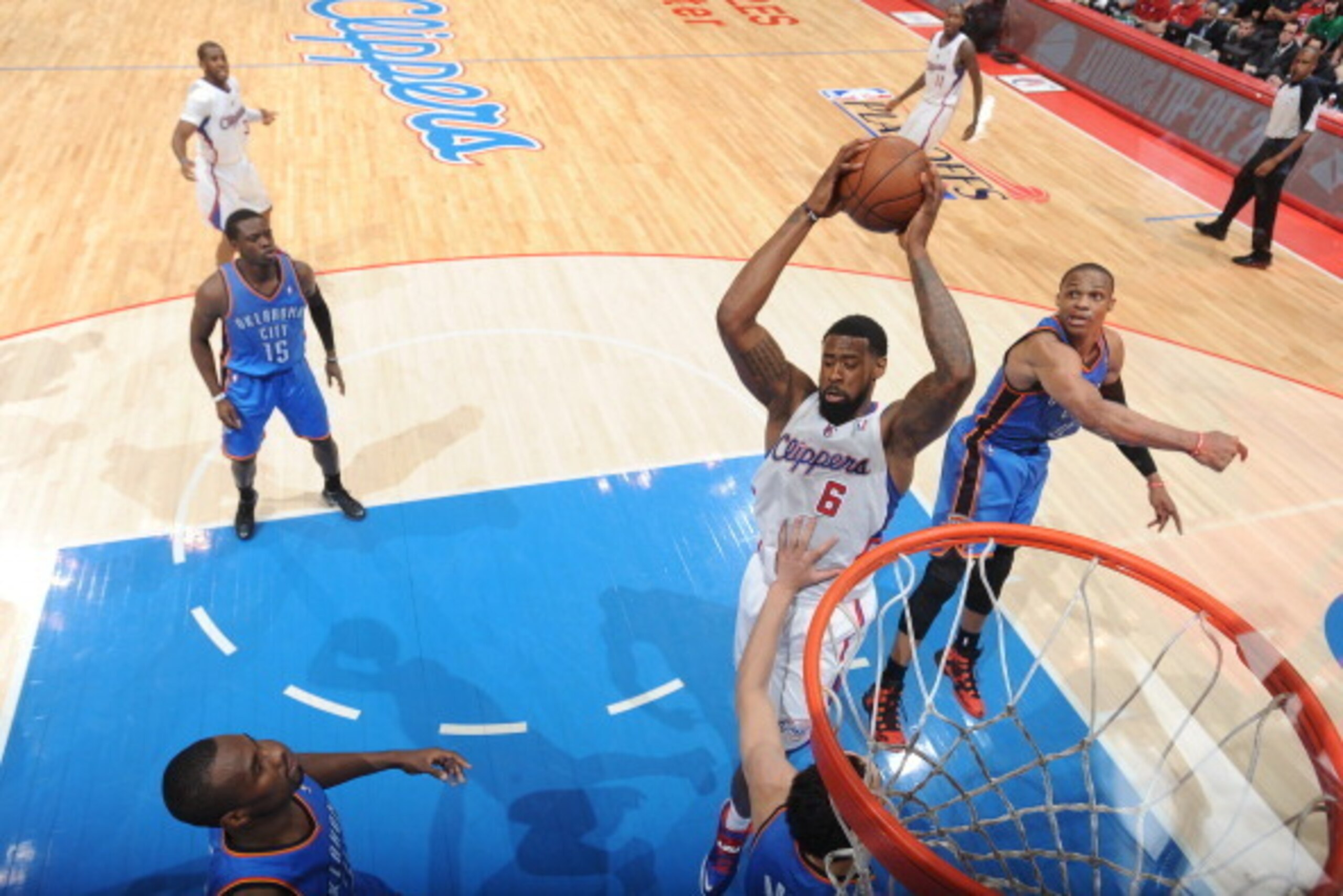 LOS ANGELES, CA - MAY 9: DeAndre Jordan #6 of the Los Angeles Clippers grabs a rebound against the Oklahoma City Thunder in Game Three of the Western Conference Semifinals during the 2014 NBA Playoffs at Staples Center on May 9, 2014 in Los Angeles, Calif