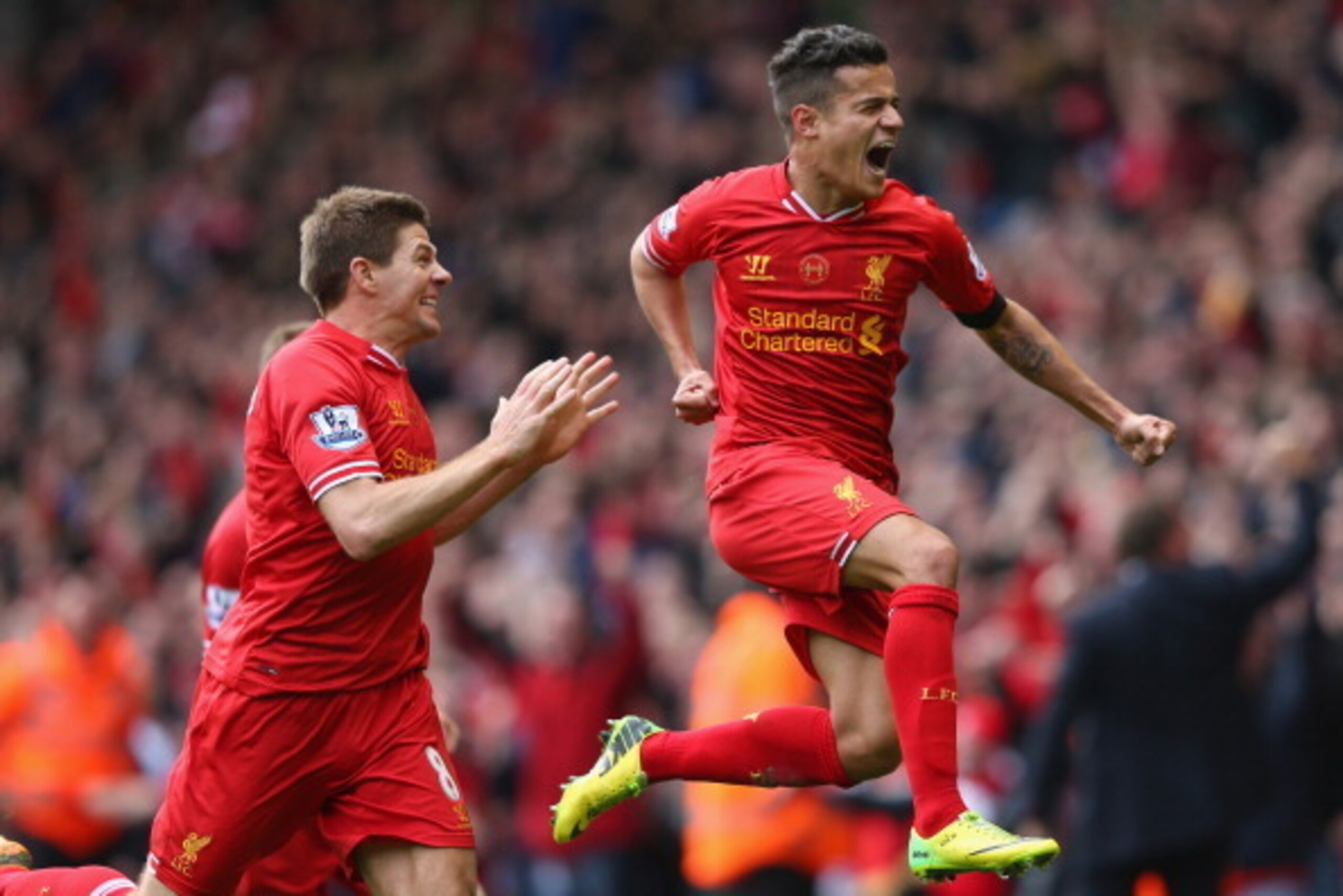 LIVERPOOL, ENGLAND - APRIL 13:  Philippe Coutinho of Liverpool celebrates scoring his team's third goal during the Barclays Premier League match between Liverpool and Manchester City at Anfield on April 13, 2014 in Liverpool, England.  (Photo by Alex Live