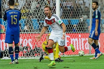 RIO DE JANEIRO, BRAZIL - JULY 13:  Mario Goetze of Germany celebrates scoring his team's first goal during the 2014 FIFA World Cup Brazil Final match between Germany and Argentina at Maracana on July 13, 2014 in Rio de Janeiro, Brazil.  (Photo by Matthias
