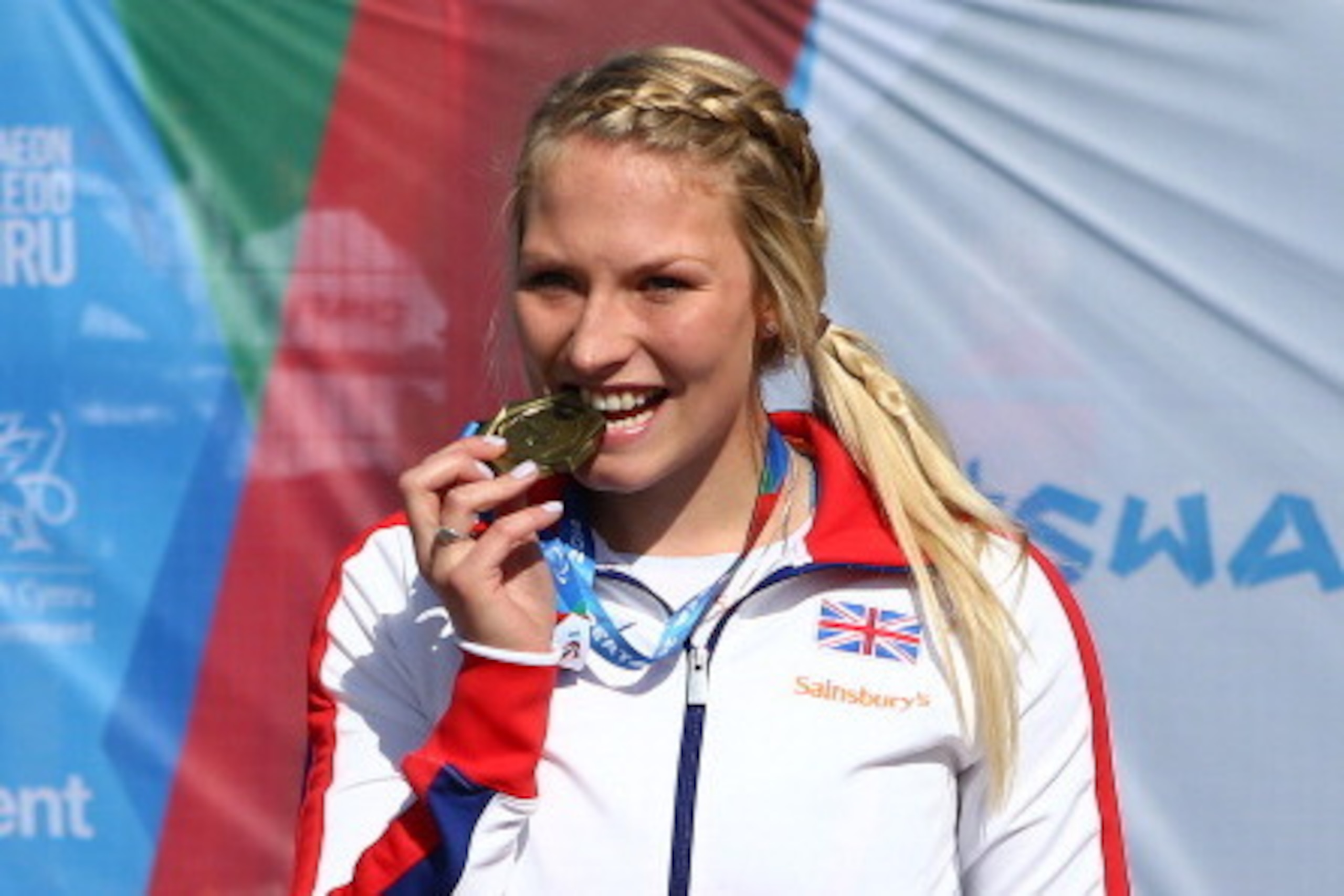 SWANSEA, WALES - AUGUST 19: Samantha Kinghorn of Great Britain celebrates winning a gold medal in the Women's 400m - T53 event during day one of the IPC Athletics European Championships at Swansea University Sports Village on August 19, 2014 in Swansea, W