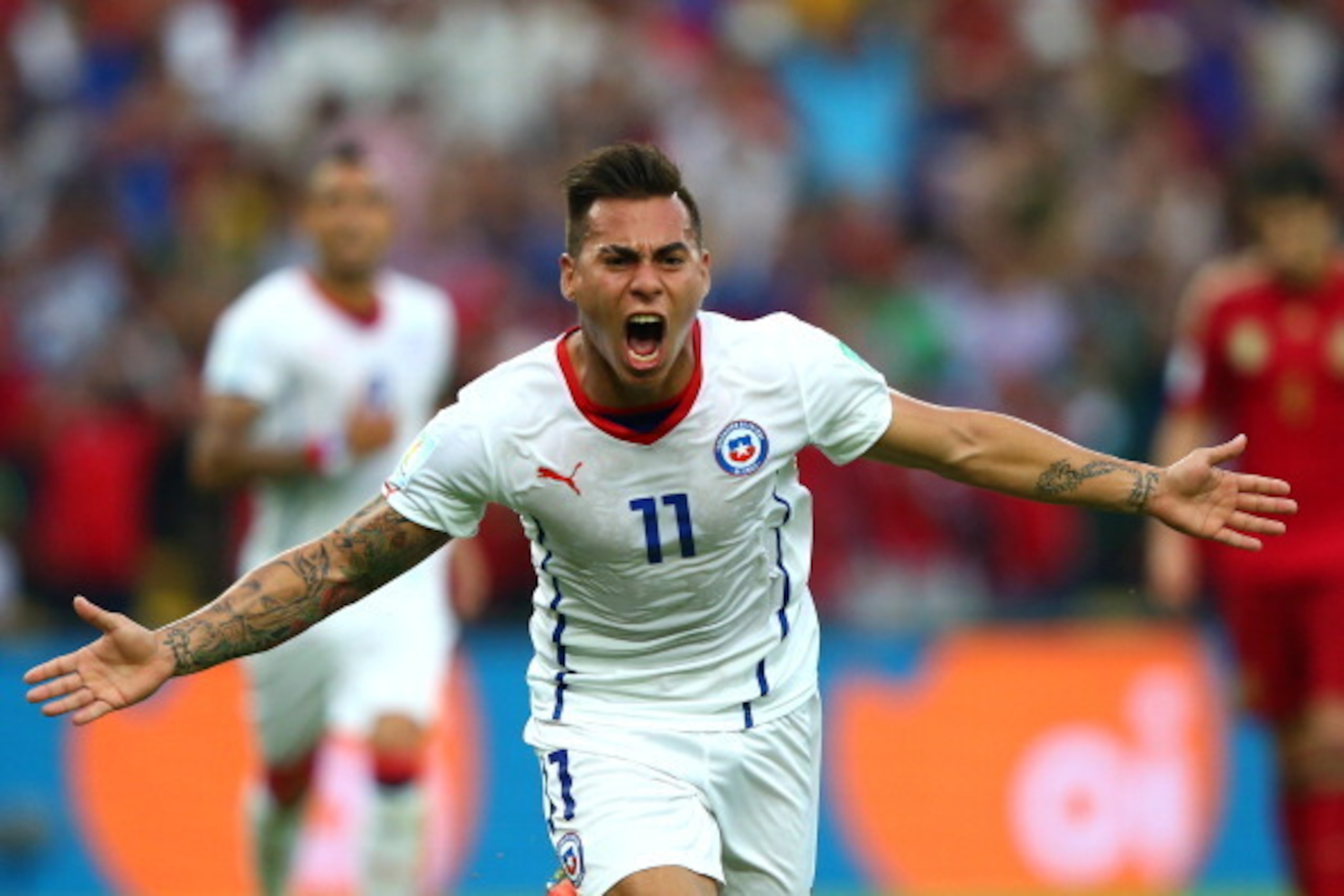 RIO DE JANEIRO, BRAZIL - JUNE 18:  Eduardo Vargas of Chile celebrates scoring his team's first goal during the 2014 FIFA World Cup Brazil Group B match between Spain and Chile at Maracana on June 18, 2014 in Rio de Janeiro, Brazil.  (Photo by Jamie Squire