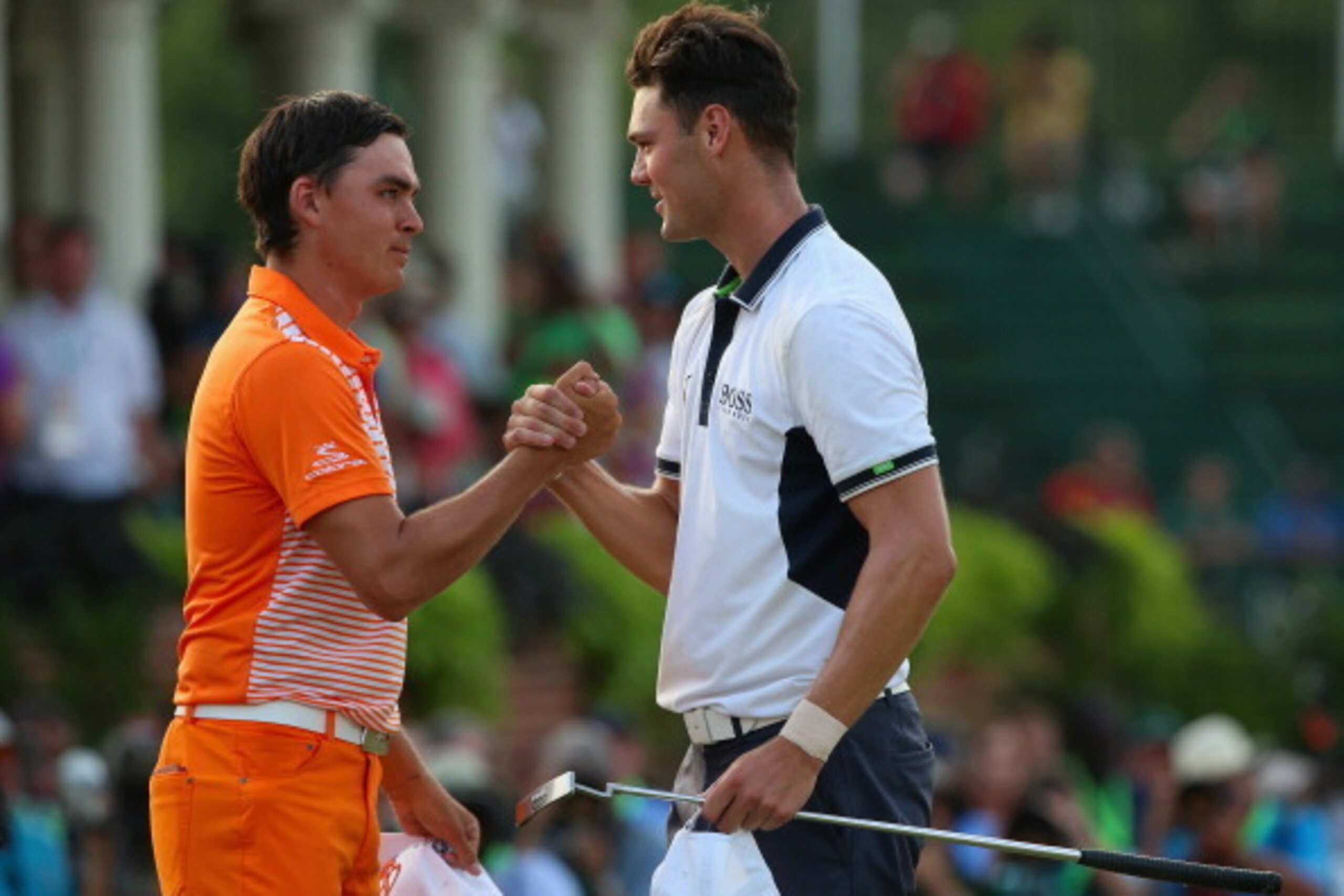 PINEHURST, NC - JUNE 15: Rickie Fowler (L) of the United States congratulates Martin Kaymer (R) of Germany on his eight-stroke victory on the 18th green during the final round of the 114th U.S. Open at Pinehurst Resort & Country Club, Course No. 2 on Jun PINEHURST, NC - JUNE 15: Rickie Fowler (L) of the United States congratulates Martin Kaymer (R) of Germany on his eight-stroke victory on the 18th green during the final round of the 114th U.S. Open at Pinehurst Resort & Country Club, Course No. 2 on Jun