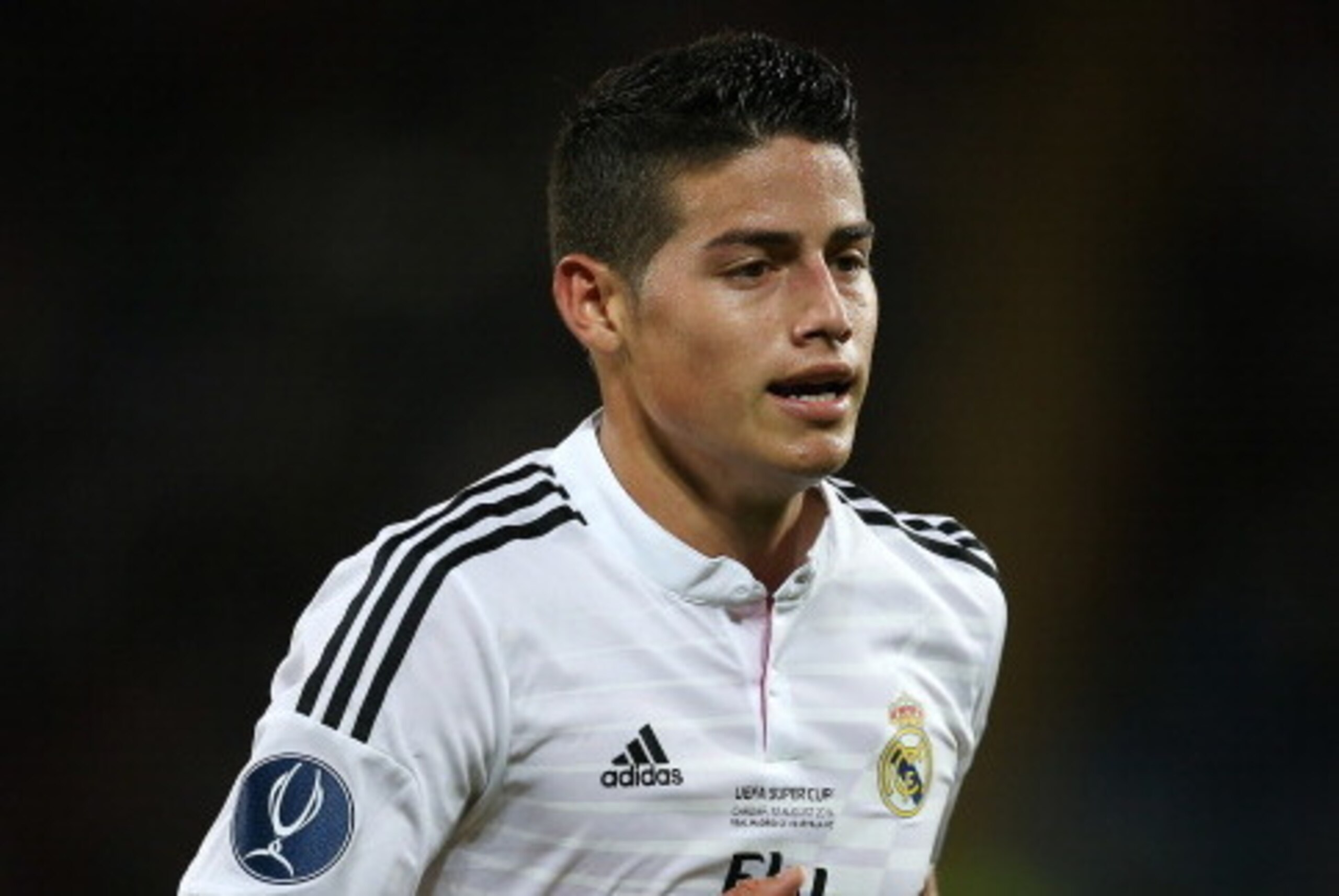 CARDIFF, WALES - AUGUST 12:  James Rodriguez of Real Madrid looks on during the UEFA Super Cup match between  Real Madrid and Sevilla at Cardiff City Stadium on August 12, 2014 Cardiff, Wales. (Photo by Ian MacNicol/Getty Images)