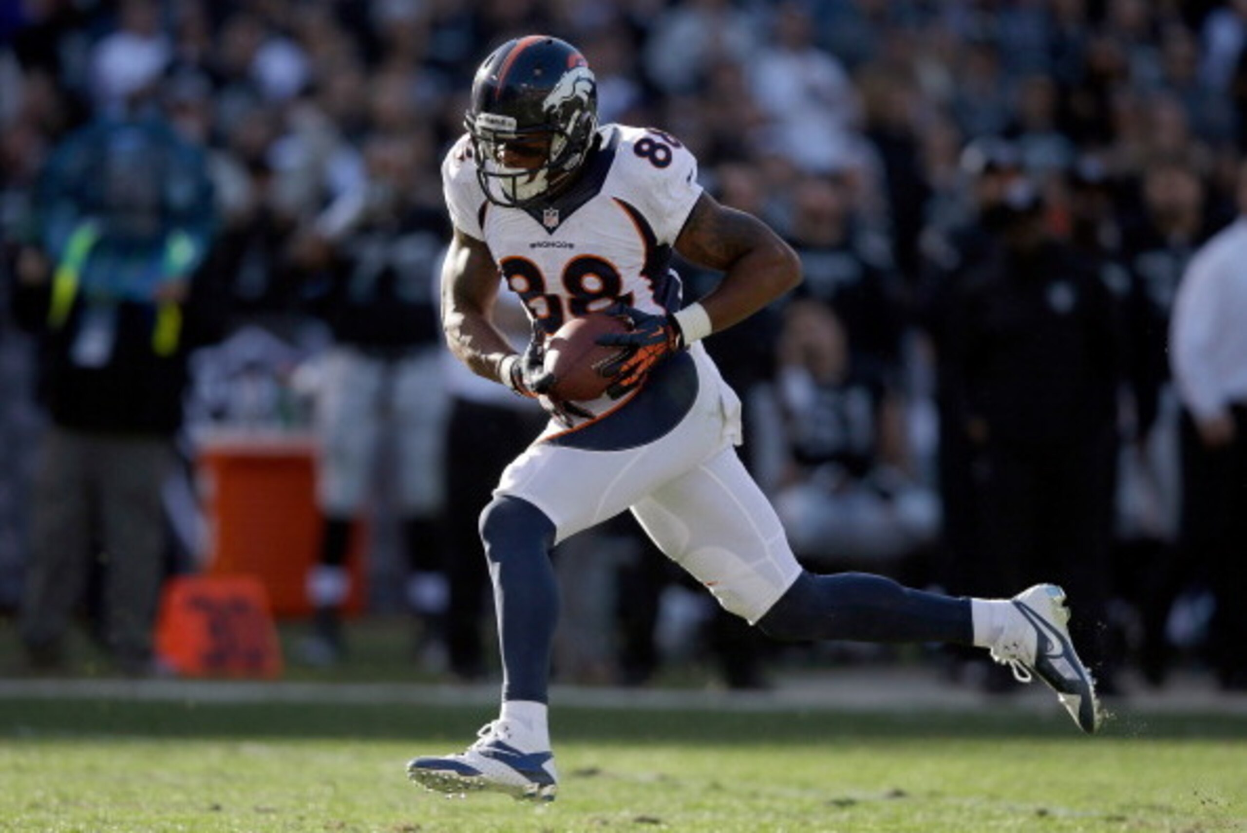 OAKLAND, CA - DECEMBER 29:  Demaryius Thomas #88 of the Denver Broncos catches a 63-yard touchdown pass from Peyton Manning #18 during their game against the Oakland Raiders at O.co Coliseum on December 29, 2013 in Oakland, California.  (Photo by Ezra Sha