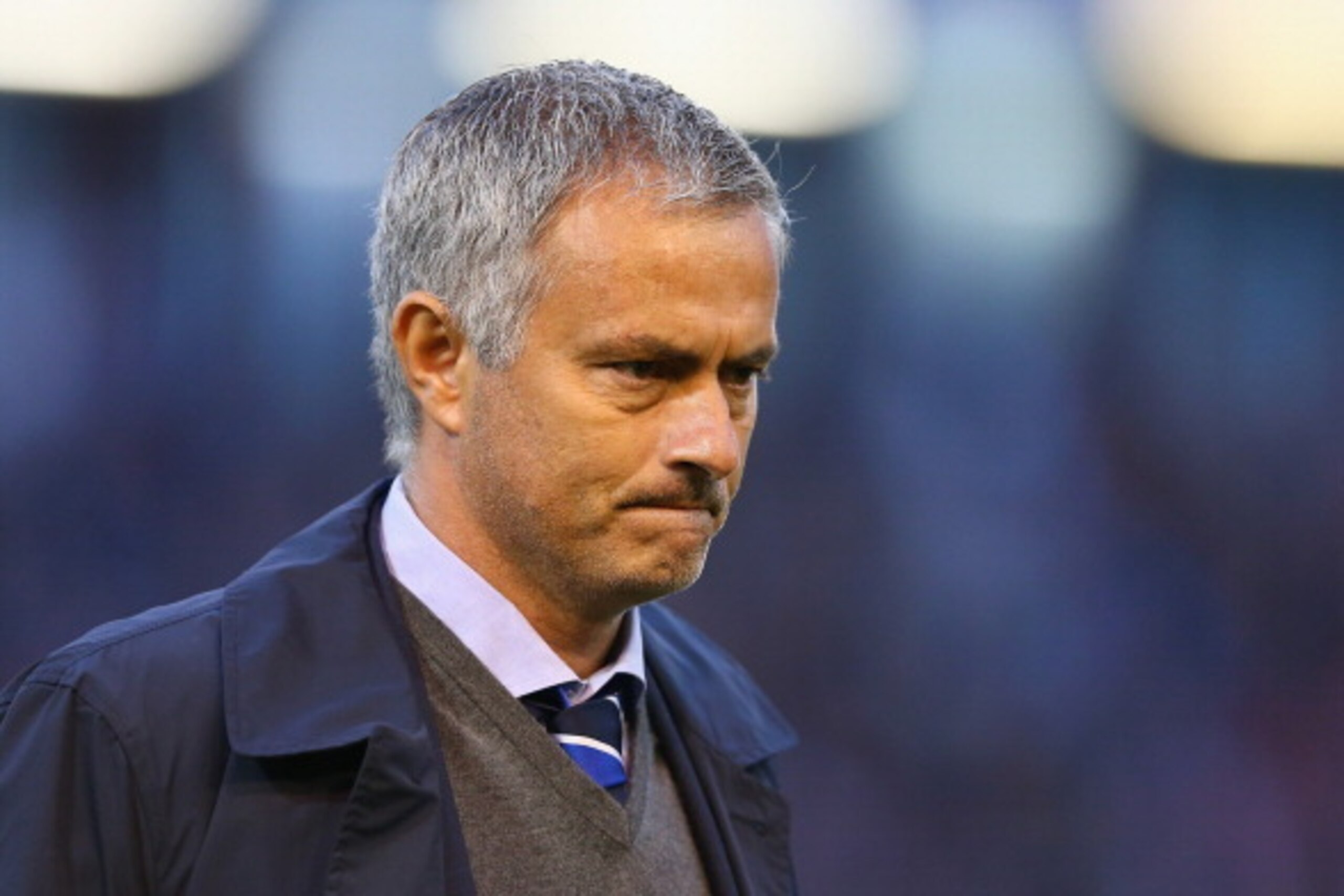 BURNLEY, ENGLAND - AUGUST 18:  Chelsea manager Jose Mourinho walks to the dug out prior to the Barclays Premier League match between Burnley and Chelsea at Turf Moor on August 18, 2014 in Burnley, England.  (Photo by Clive Brunskill/Getty Images)