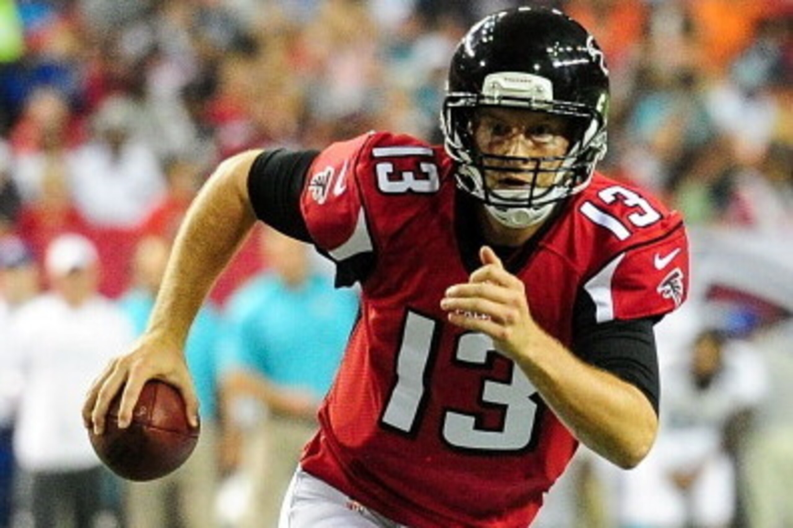 ATLANTA, GA - AUGUST 08: T.J. Yates #13 of the Atlanta Falcons runs the ball in the third quarter of a preseason game against the Miami Dolphins at the Georgia Dome on August 8, 2014 in Atlanta, Georgia. (Photo by Scott Cunningham/Getty Images)