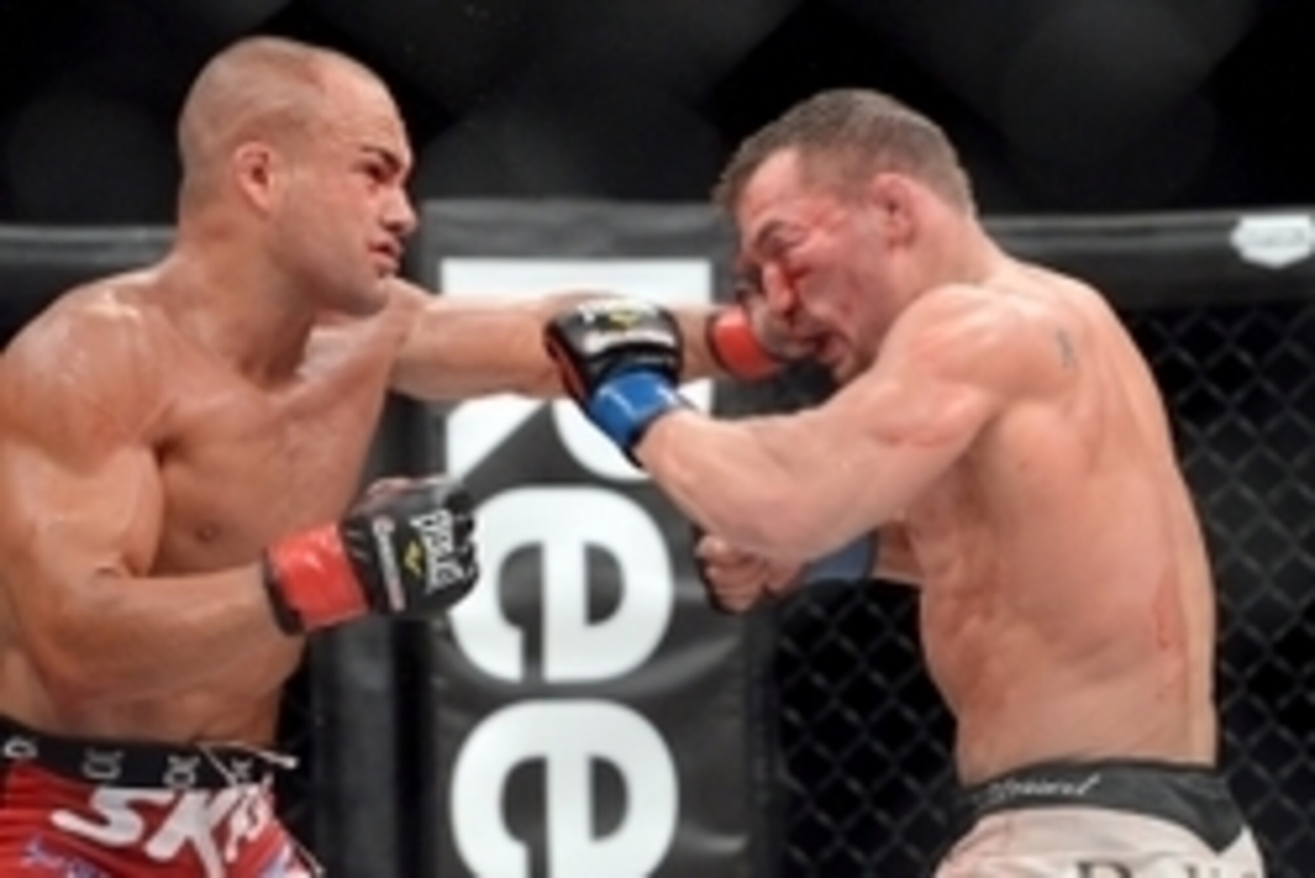 Nov 2, 2013; Long Beach, CA, USA; Eddie Alvarez (red gloves ) and Michael Chandler (blue gloves) during their Bellator Lightweight World Championship fight at the Long Beach Arena. Alvarez won the fight. Mandatory Credit: Jayne Kamin-Oncea-USA TODAY Spo Nov 2, 2013; Long Beach, CA, USA; Eddie Alvarez (red gloves ) and Michael Chandler (blue gloves) during their Bellator Lightweight World Championship fight at the Long Beach Arena. Alvarez won the fight. Mandatory Credit: Jayne Kamin-Oncea-USA TODAY Spo