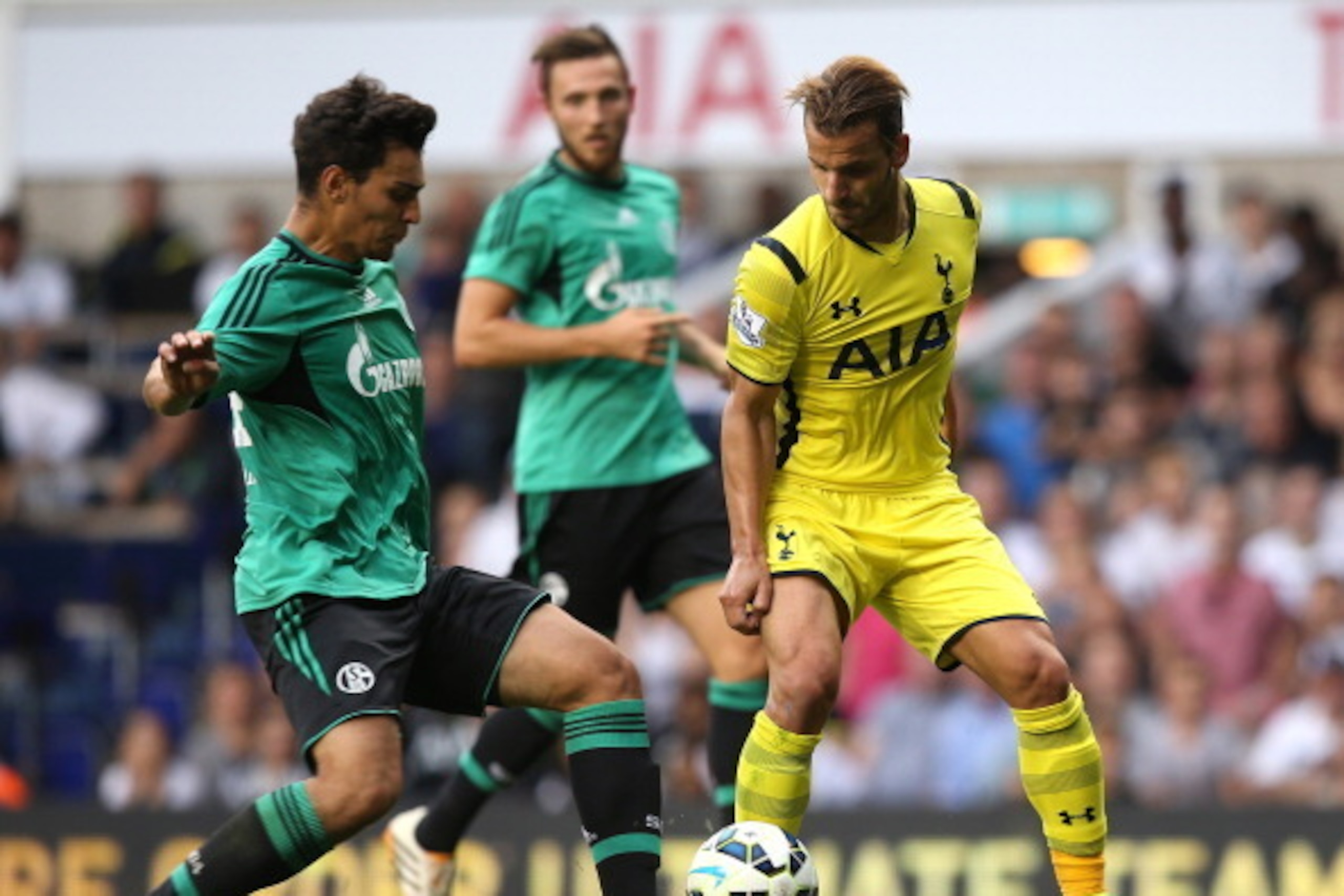 LONDON, ENGLAND - AUGUST 09:  Roberto Soldado (R) of Spurs battles with Kaan Ayhan of Schalke during a pre season friendly match between Tottenham Hotspur and FC Schalke at White Hart Lane on August 9, 2014 in London, England.  (Photo by Jan Kruger/Getty 