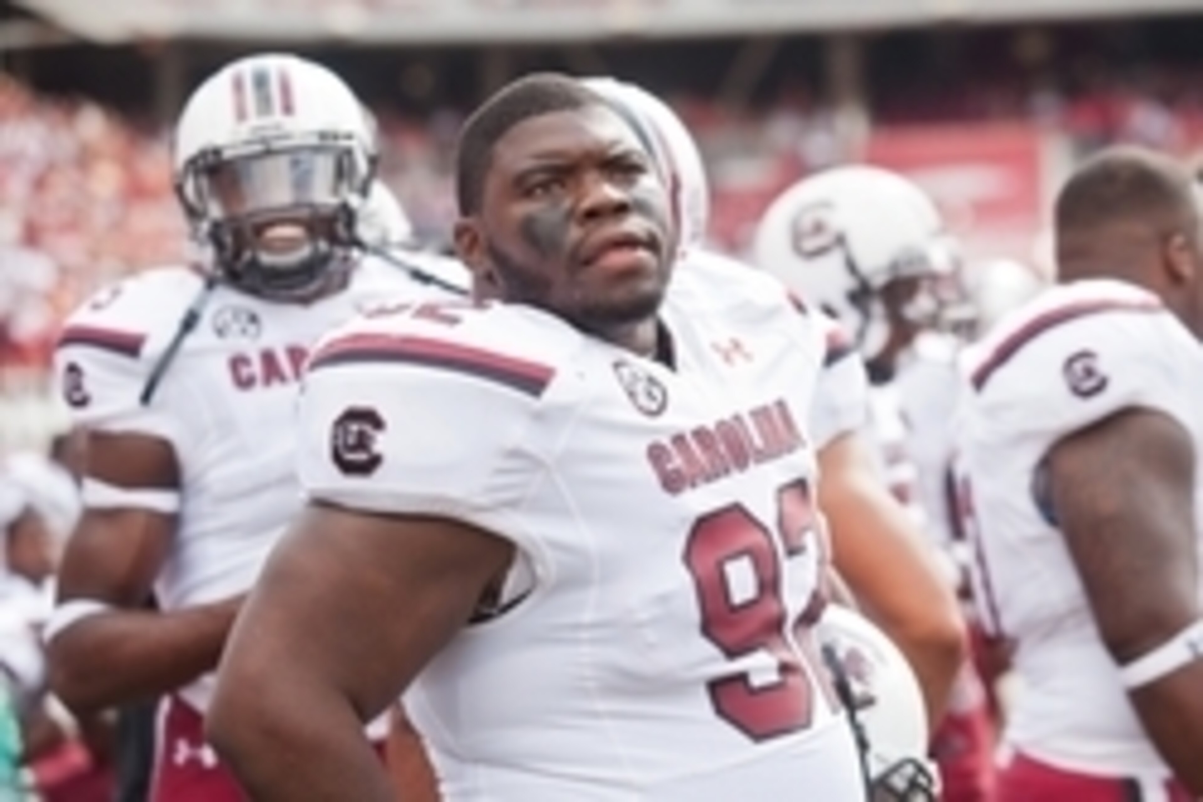 Oct 12, 2013; Fayetteville, AR, USA; South Carolina Gamecock defensive tackle Gerald Dixon Jr. (92) looks up from the sidelines during a game against the Arkansas Razorbacks at Donald W. Reynolds Razorback Stadium. South Carolina defeated Arkansas 52-7. M